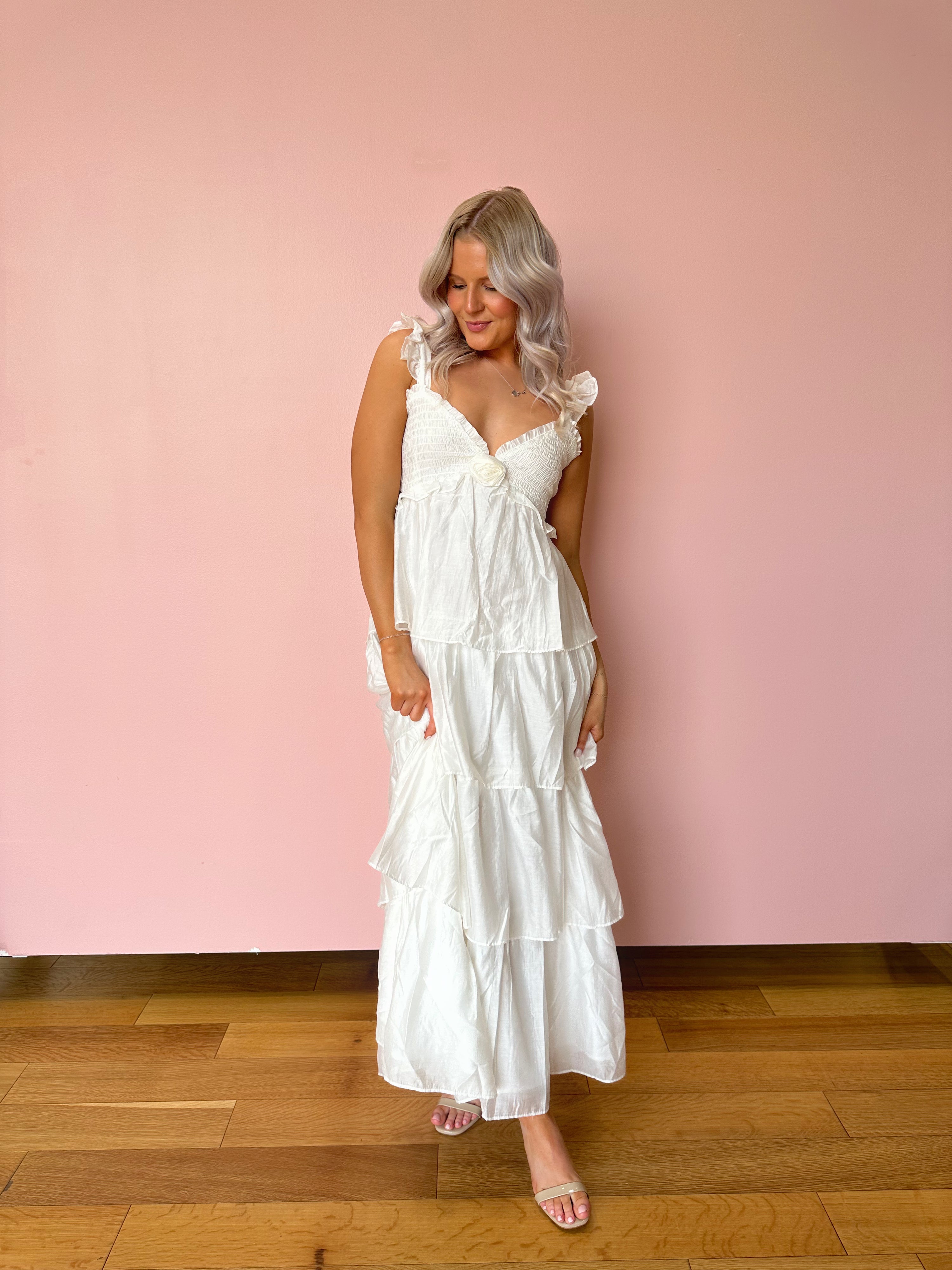 White tiered maxi dress with rosette detail. Great for brides. 