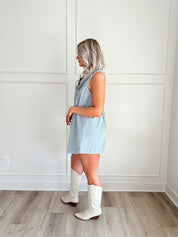 Light wash denim romper with functional pockets
