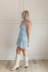 Baby blue tiered mini dress with ruffle straps. 
