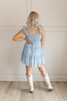 Baby blue tiered mini dress with ruffle straps. 