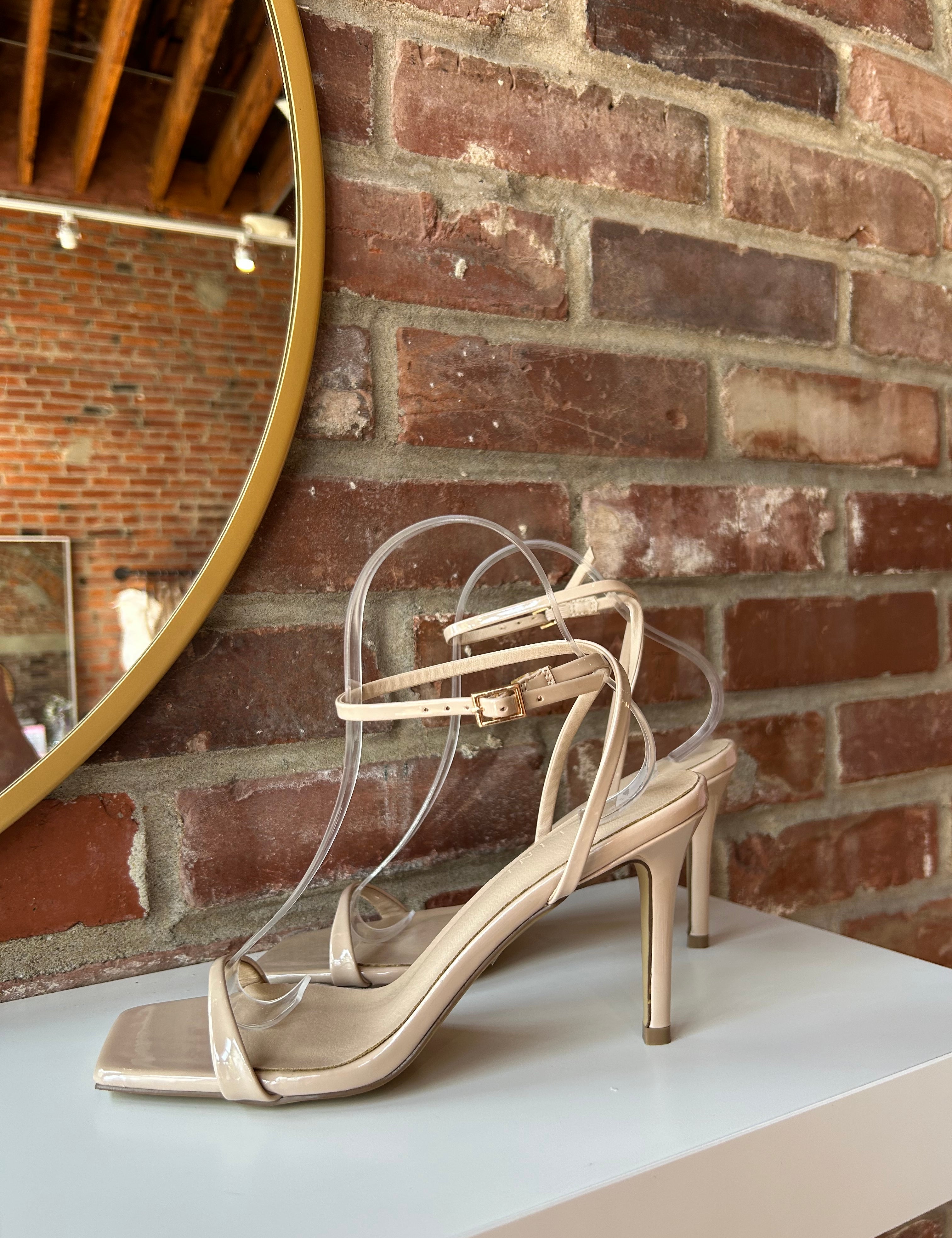 Nude stiletto sandal with square toe and nude ankle strap