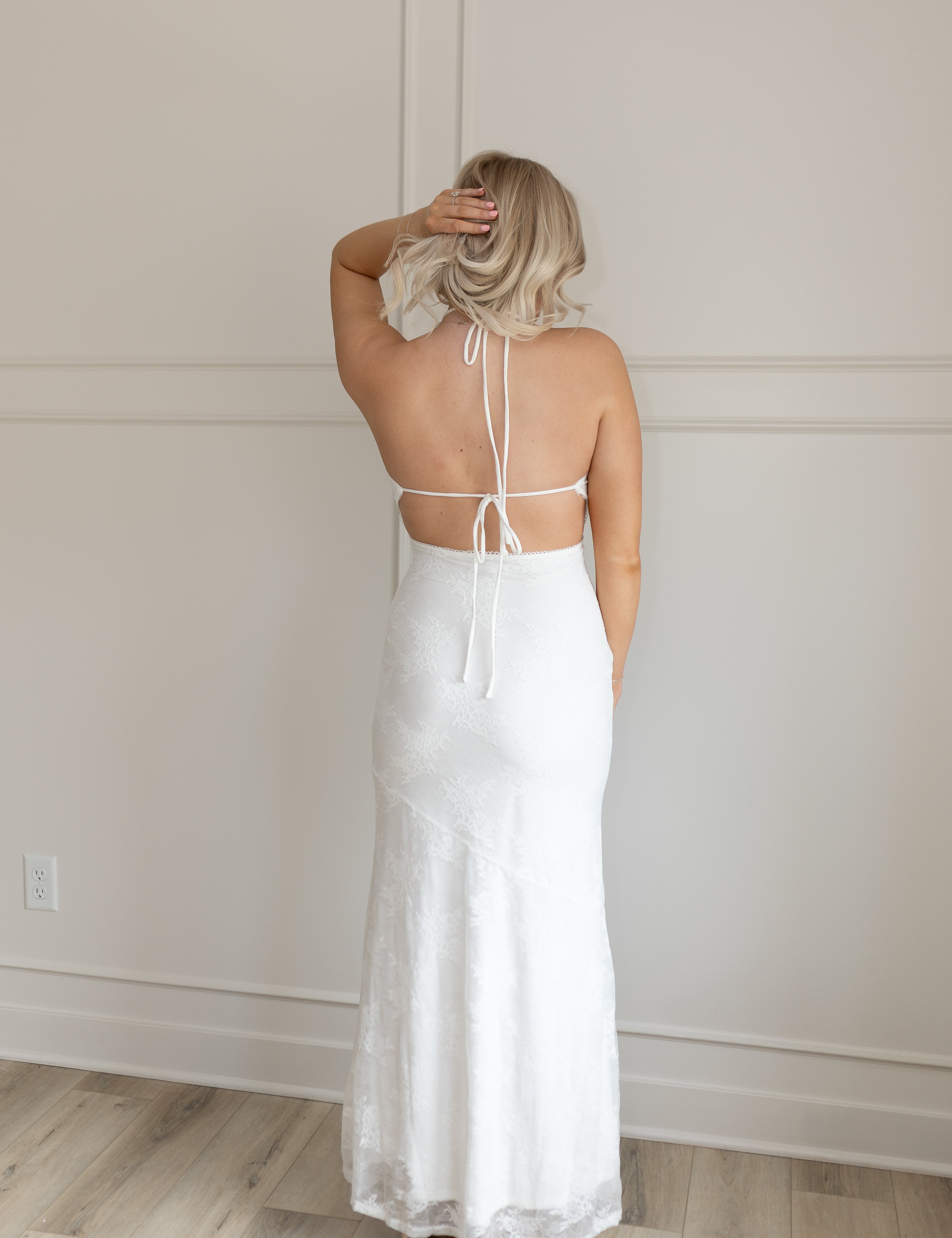 White lace halter maxi dress with open back and tie straps