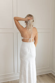 White lace halter maxi dress with open back and tie straps