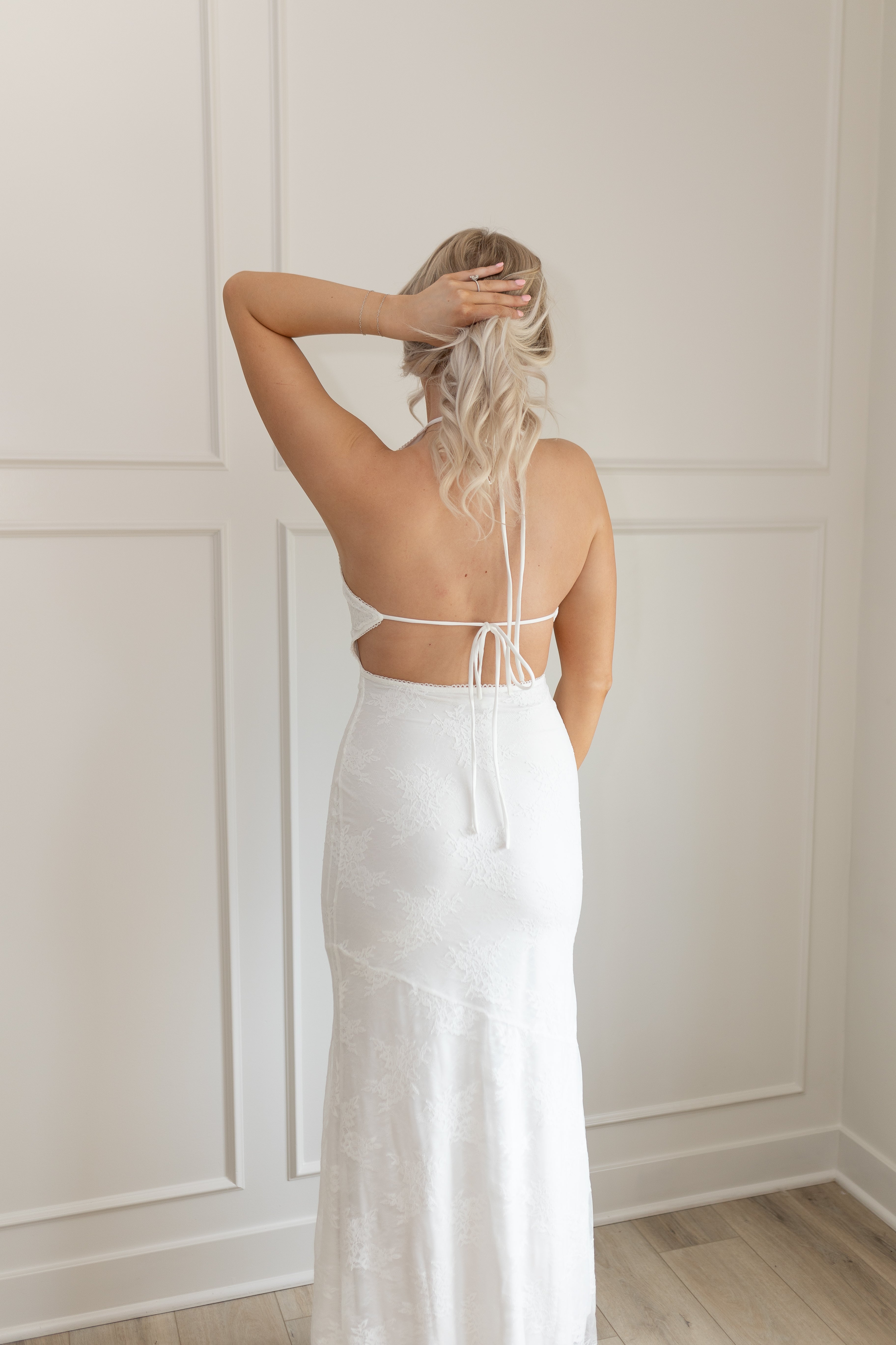 White lace halter maxi dress with open back and tie straps