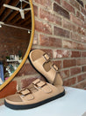 Brown flat sandal with good hardware buckle. Perfect for everyday wear.