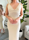 Light tan knit midi dress with open tie back. 