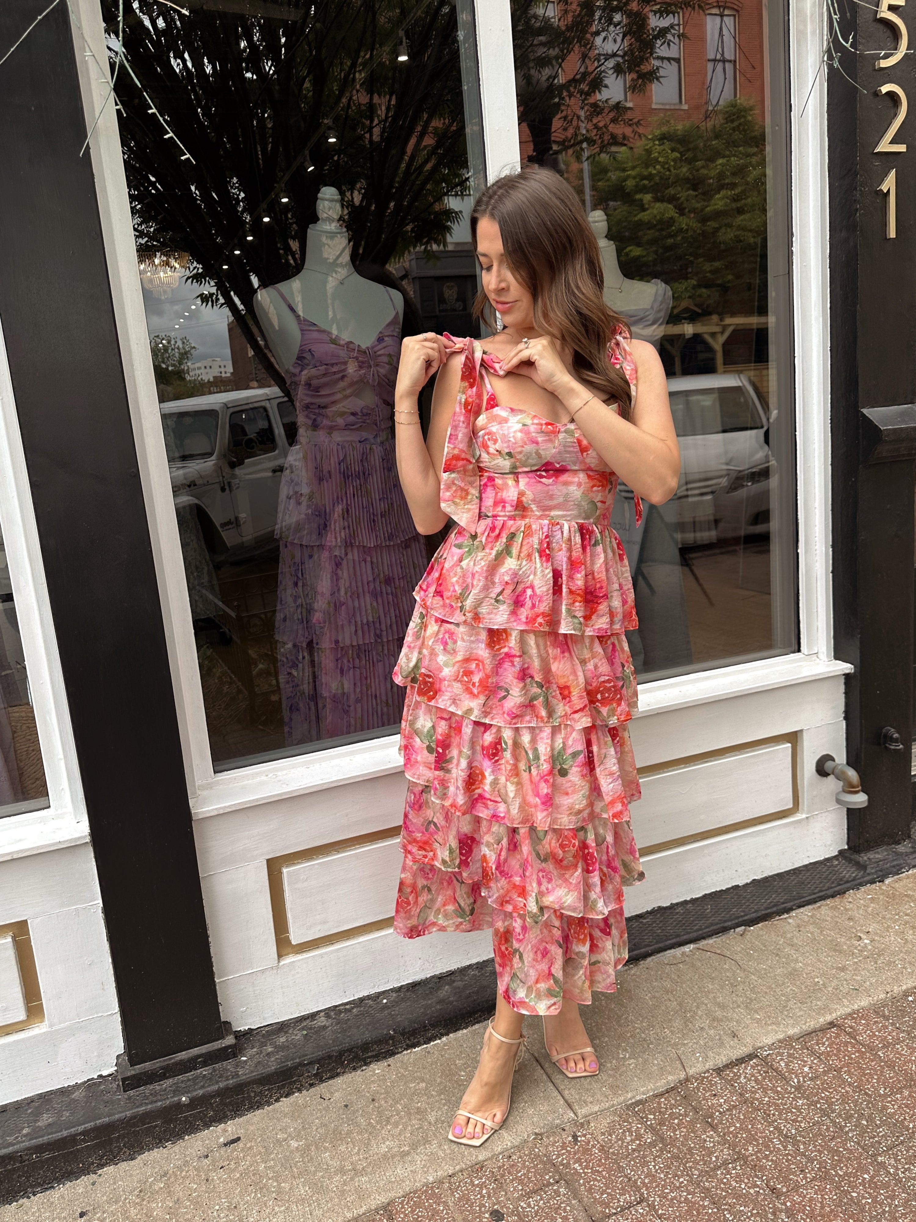 Pink floral tiered midi dress with ruffle layers and tie shoulder straps