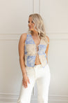 Blue and cream patchwork top with crochet lace detailing. 