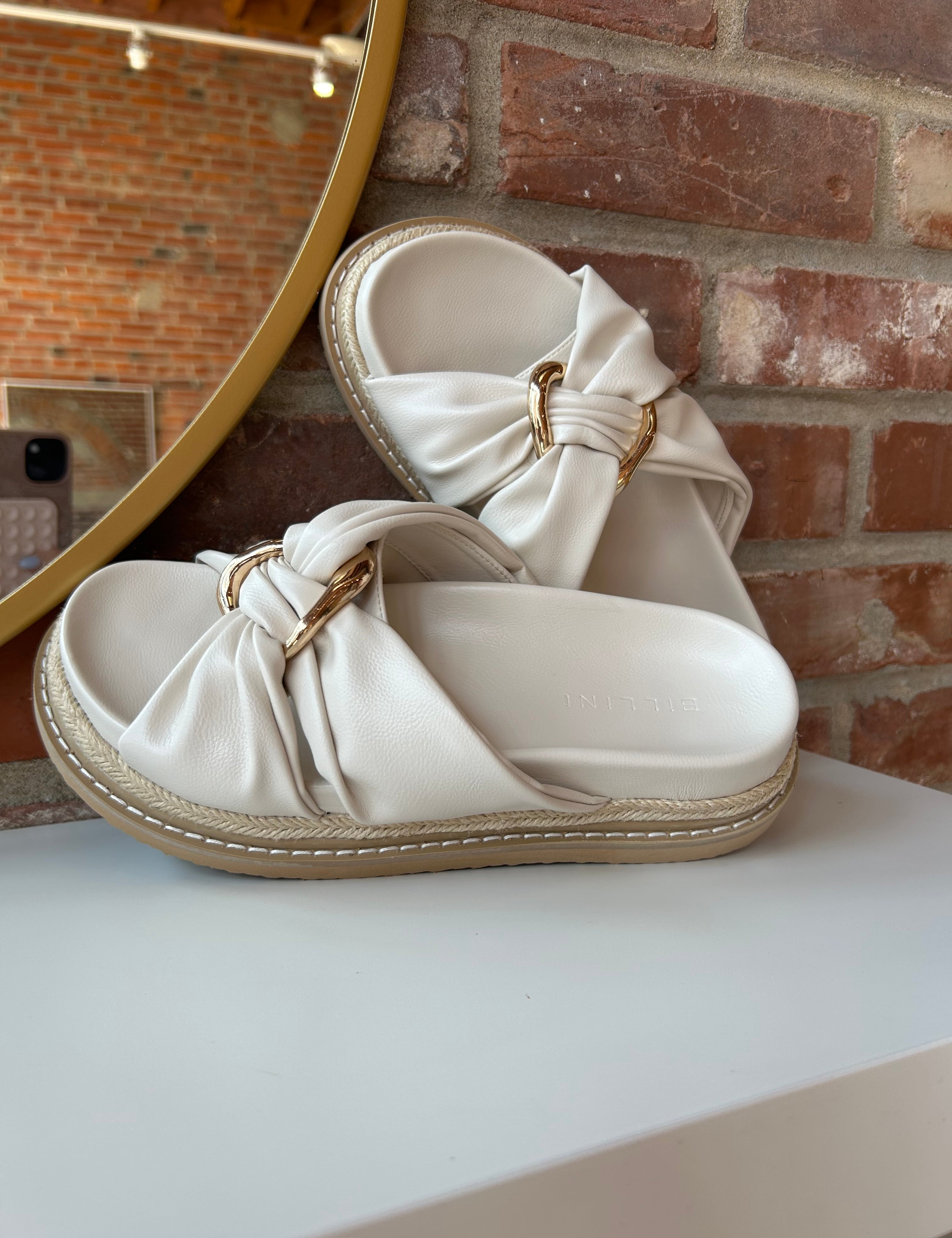 Billini Cove Gold Embellished Platform Sandal with a knotted upper, gold accents, and a woven platform sole for chic style.