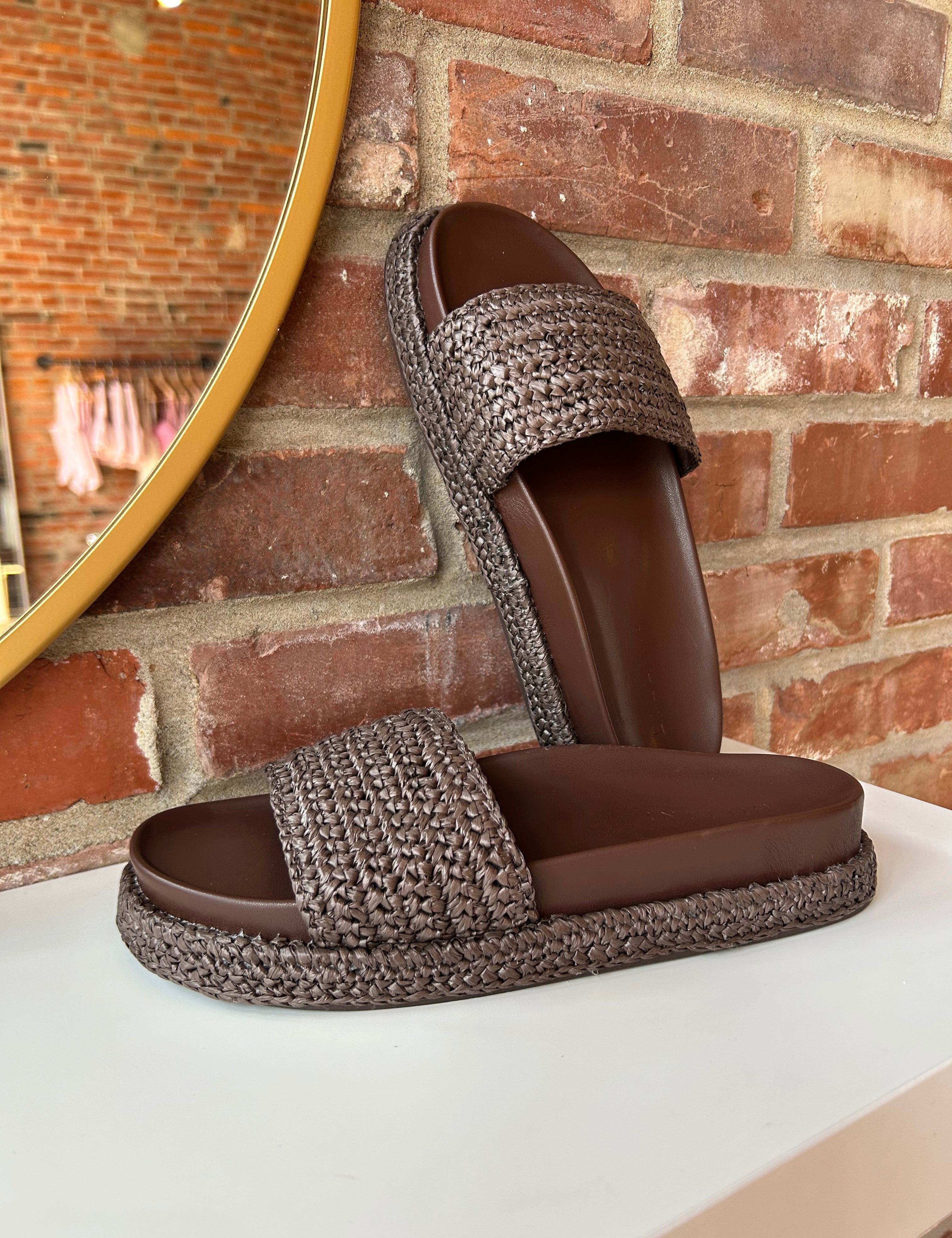 Billini Annie Brown Woven Sandal with a braided strap, cushioned sole, and slip-on design for a chic and comfortable look.