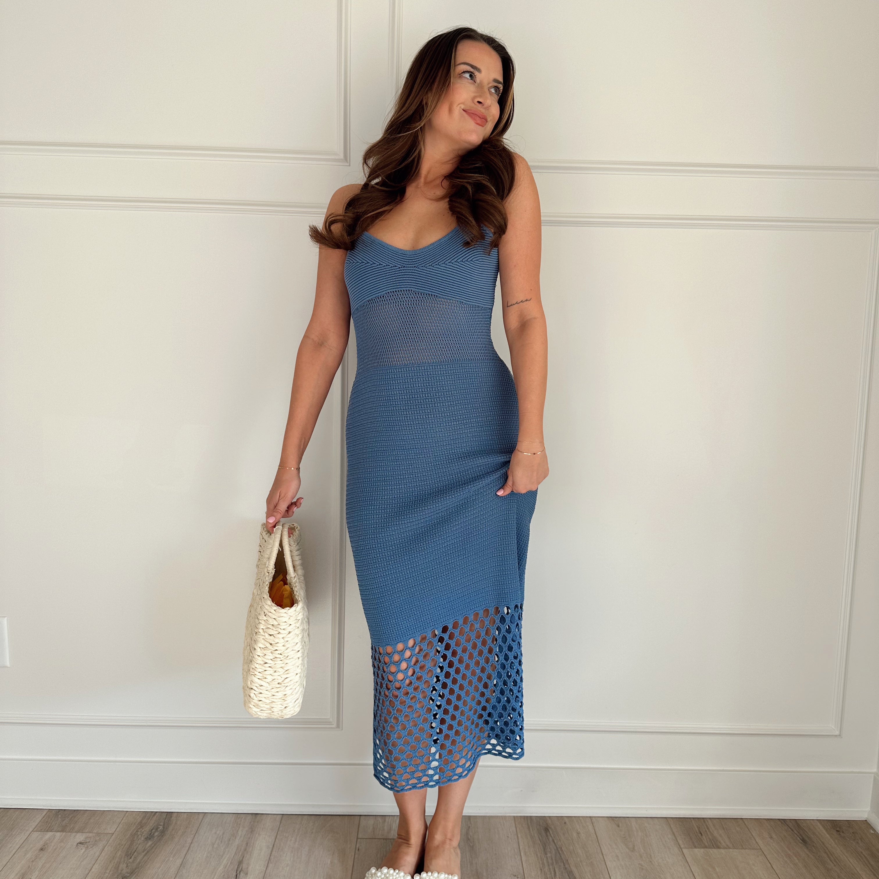 Blue knit midi dress with slits up the side. Also comes in cream and black. 