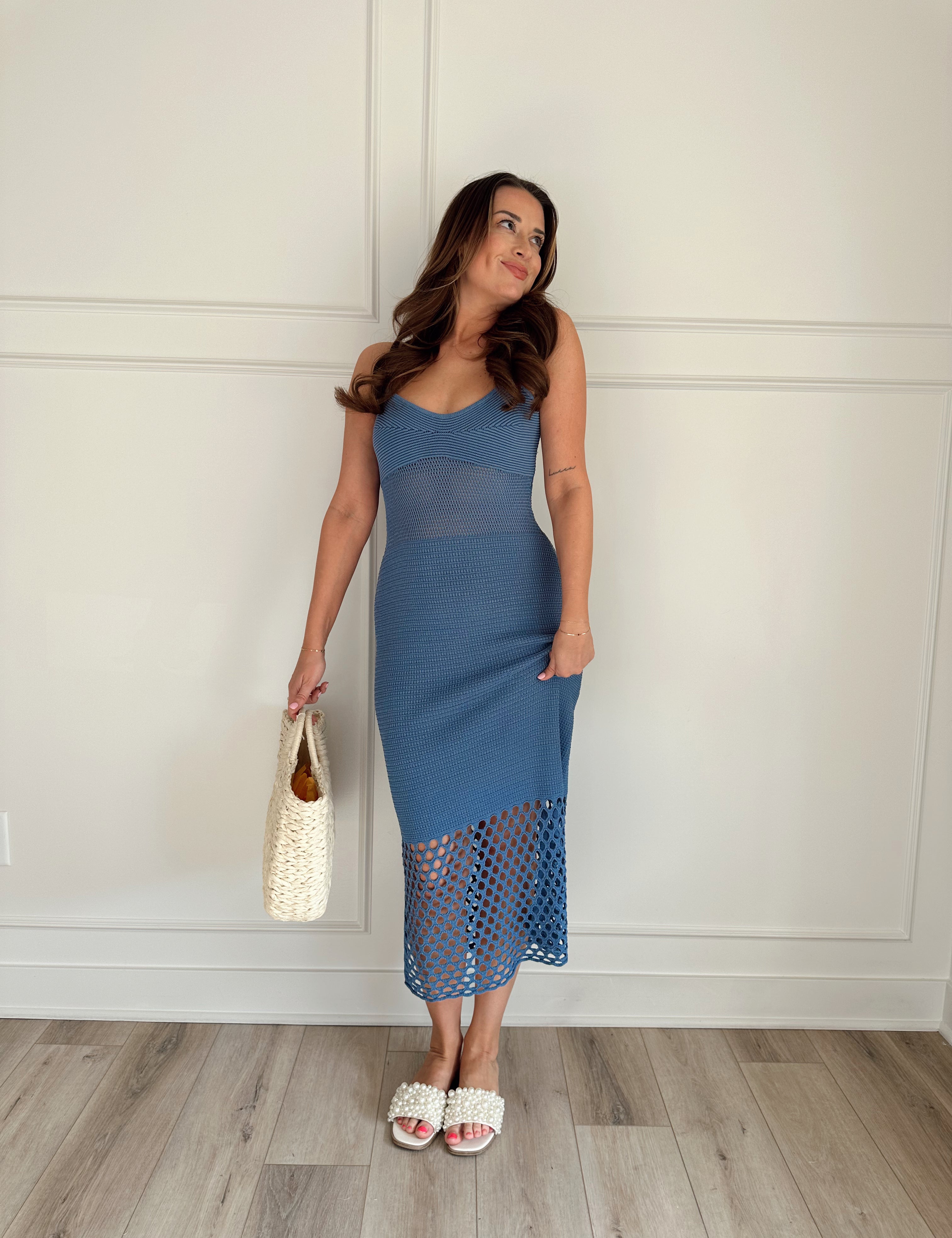 Blue knit midi dress with slits up the side. Also comes in cream and black. 