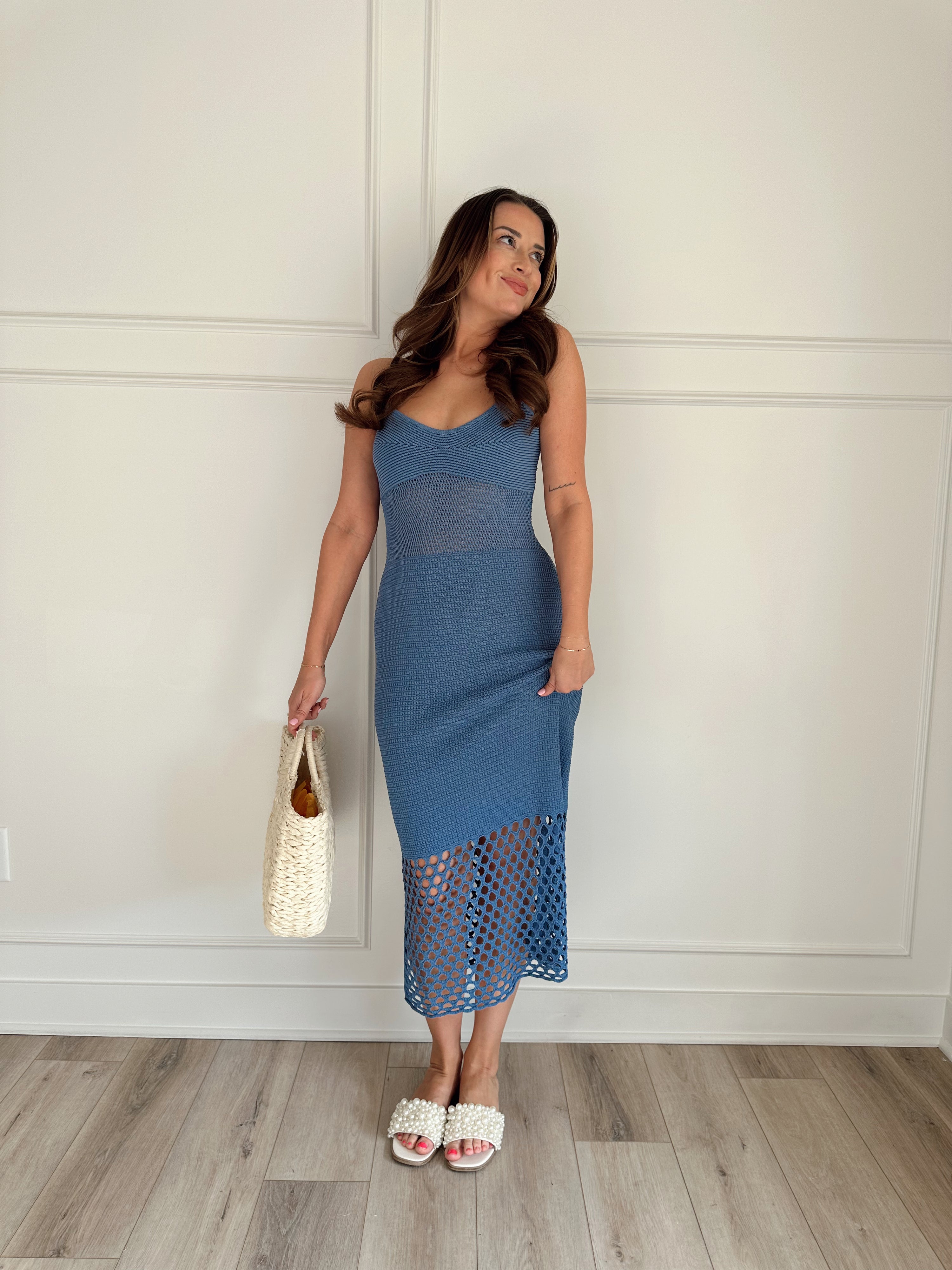Blue knit midi dress with slits up the side. Also comes in cream and black. 