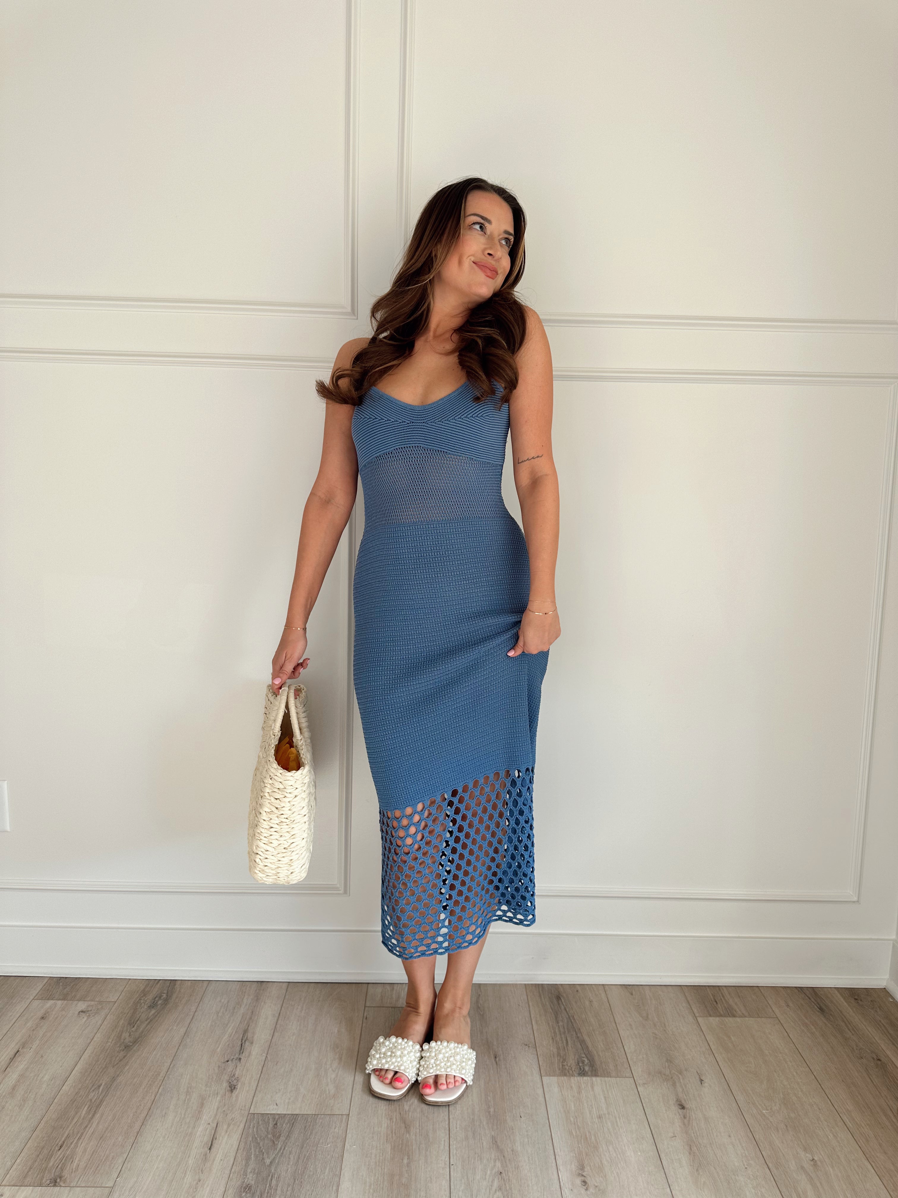 Blue knit midi dress with slits up the side. Also comes in cream and black. 