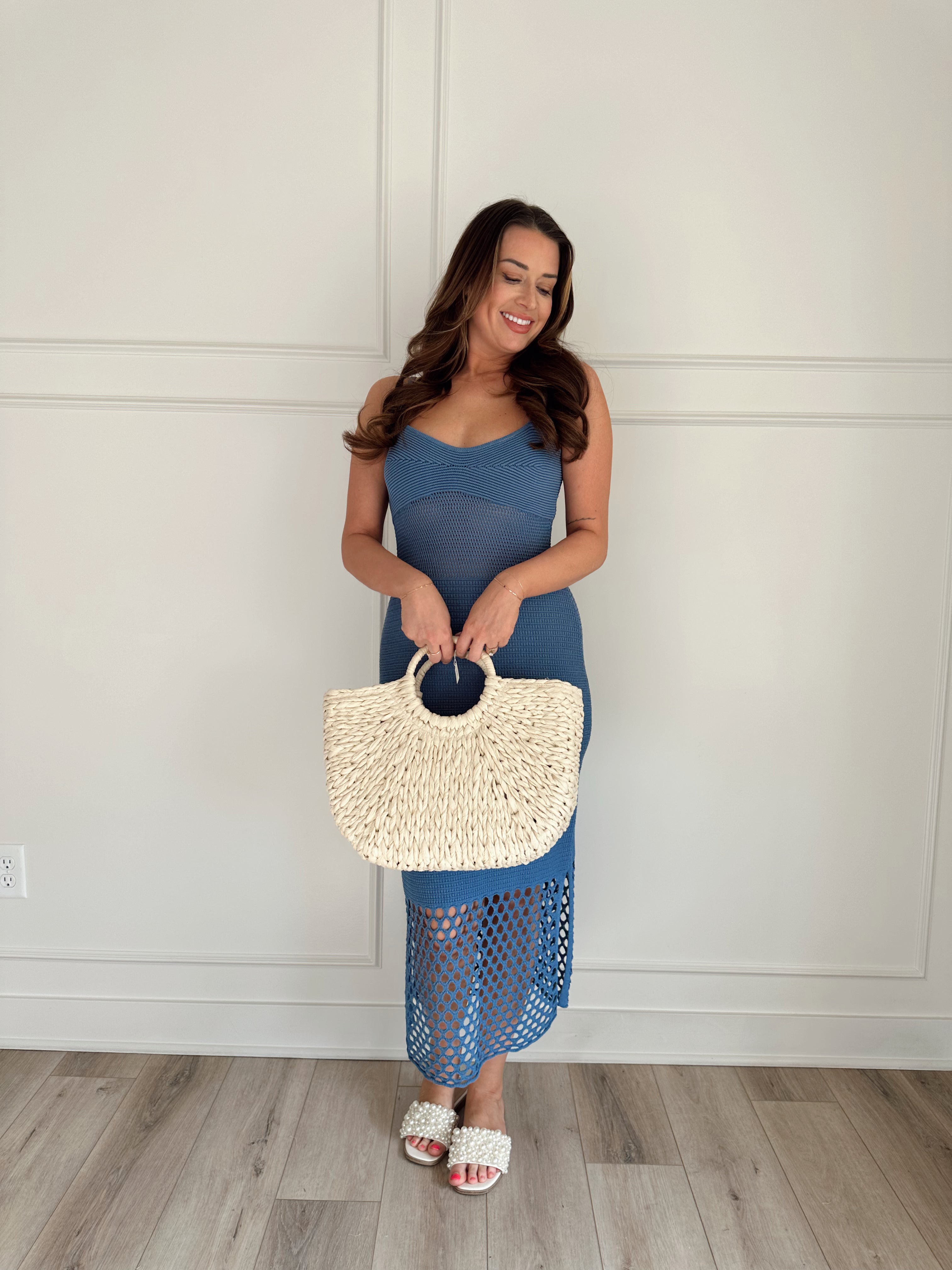 Blue knit midi dress with slits up the side. Also comes in cream and black. 
