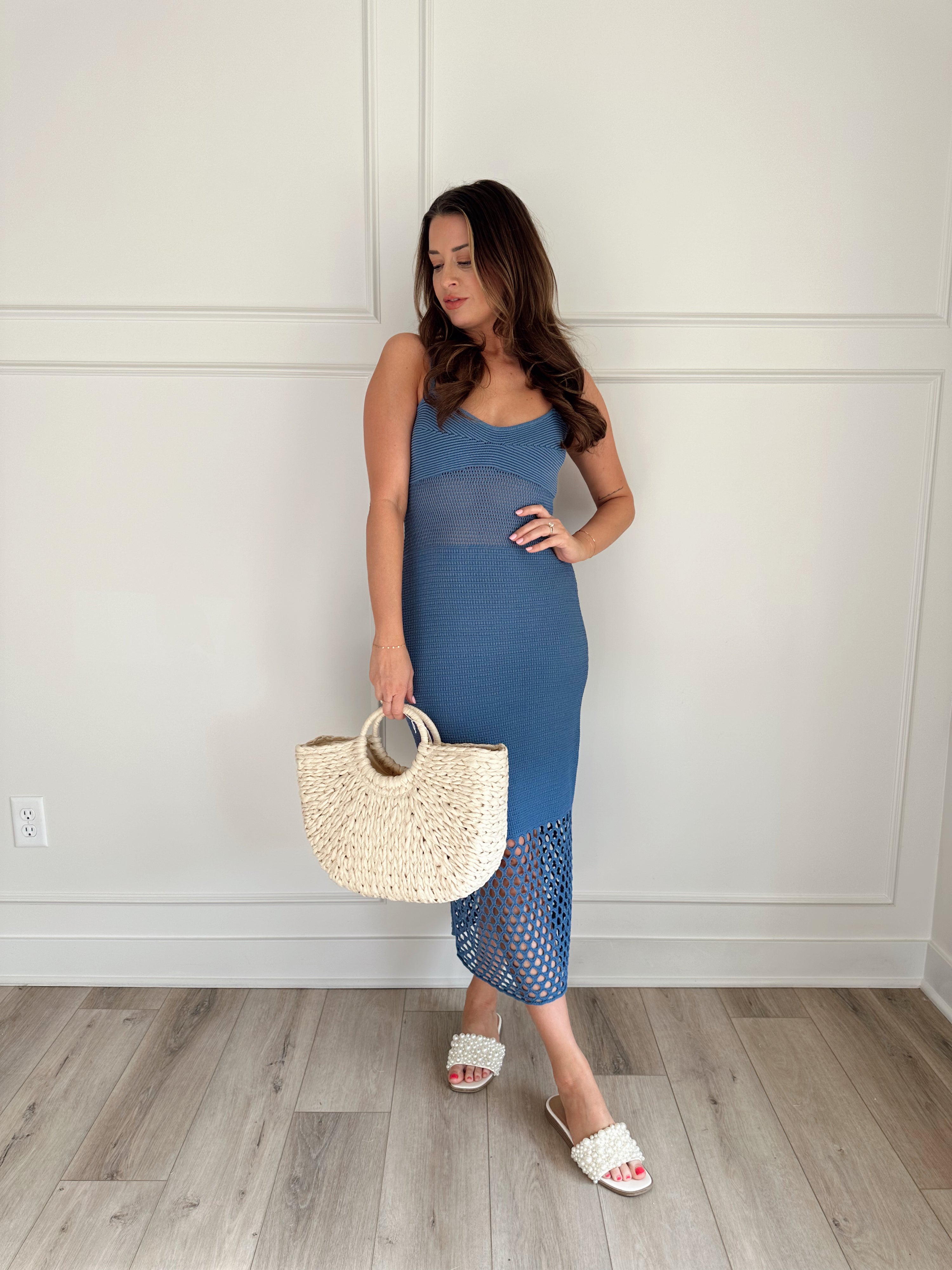 Blue knit midi dress with slits up the side. Also comes in cream and black. 