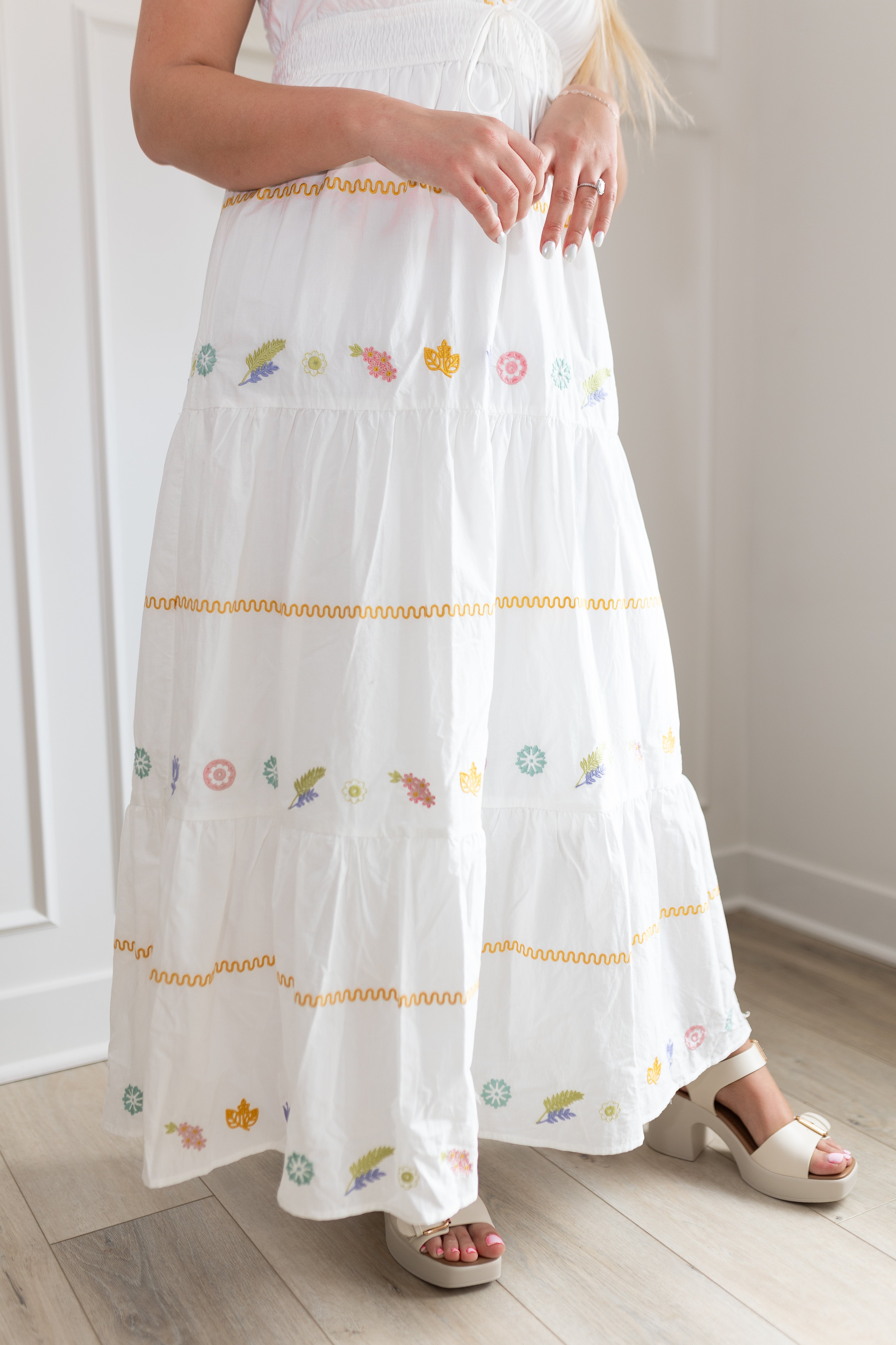 White halter maxi dress with multicolored embroidered seashells. 