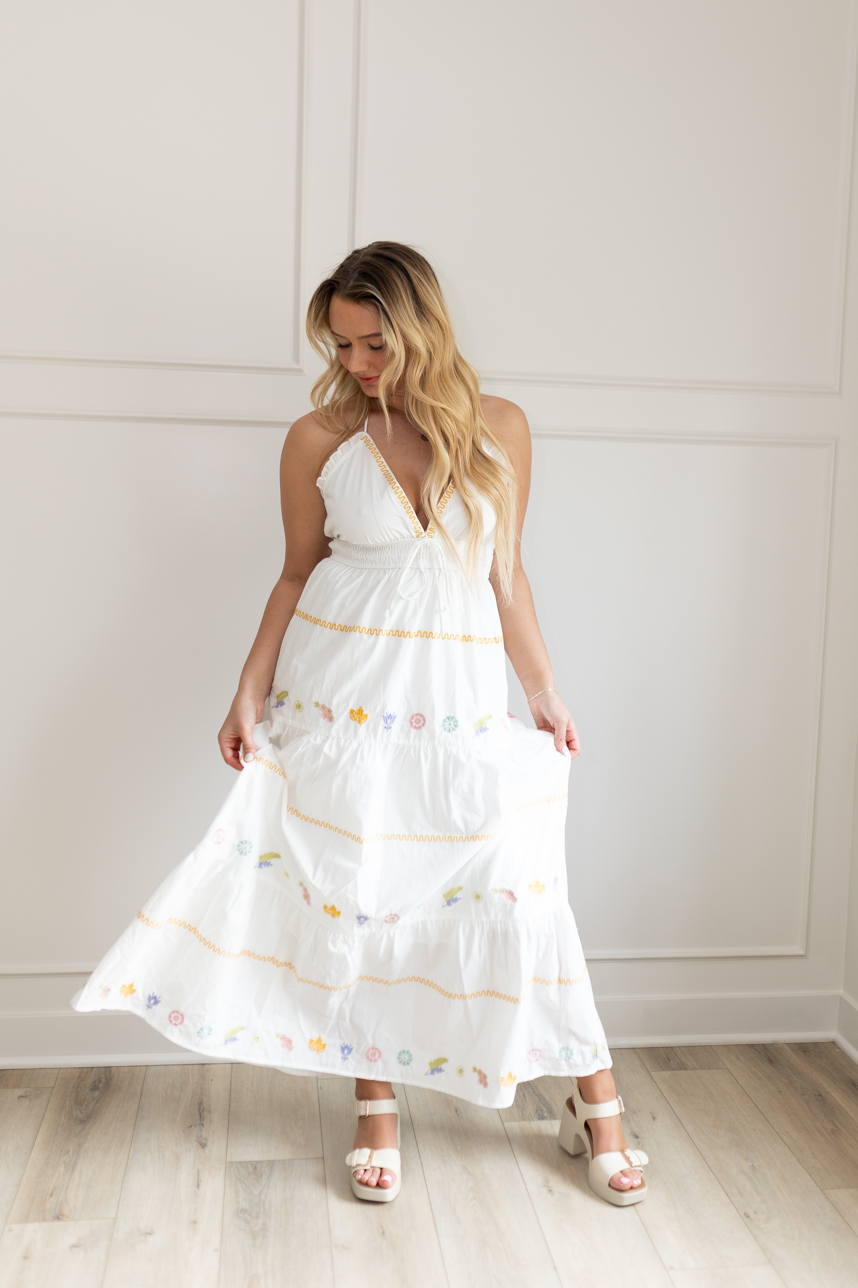 White halter maxi dress with multicolored embroidered seashells. 