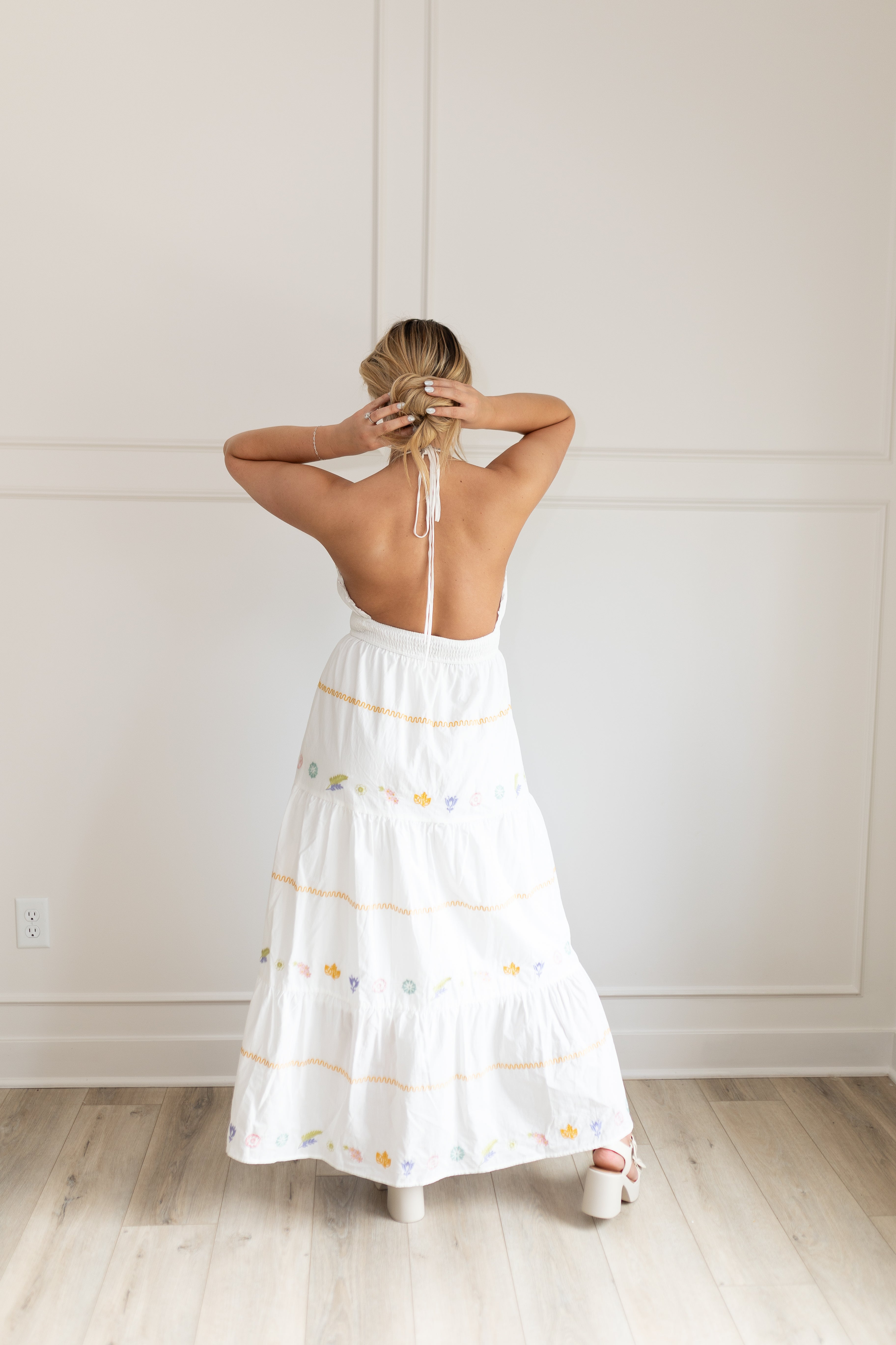 White halter maxi dress with multicolored embroidered seashells. 