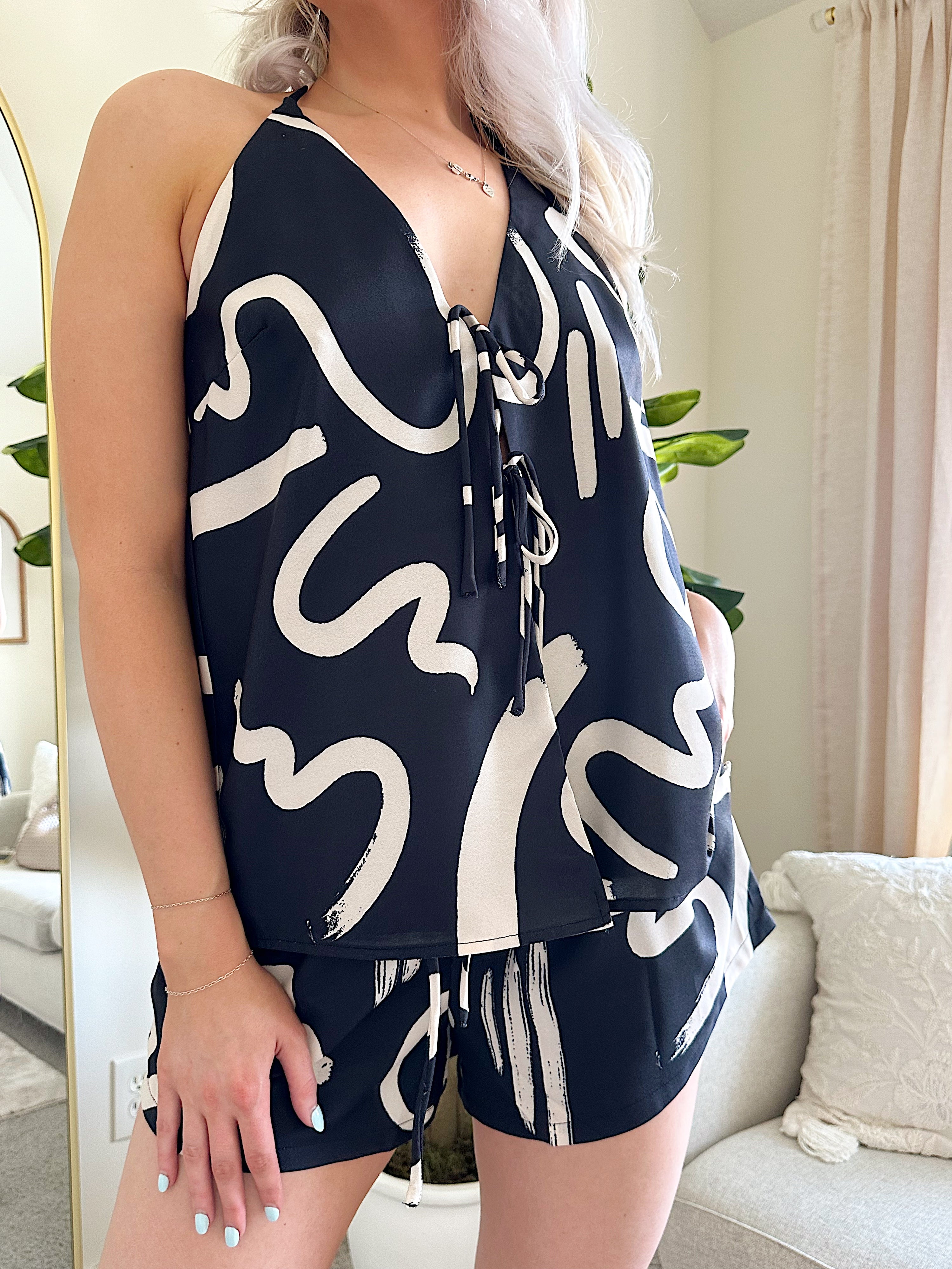 Black and Stone abstract two piece set with open back tie top and high waisted shorts. 