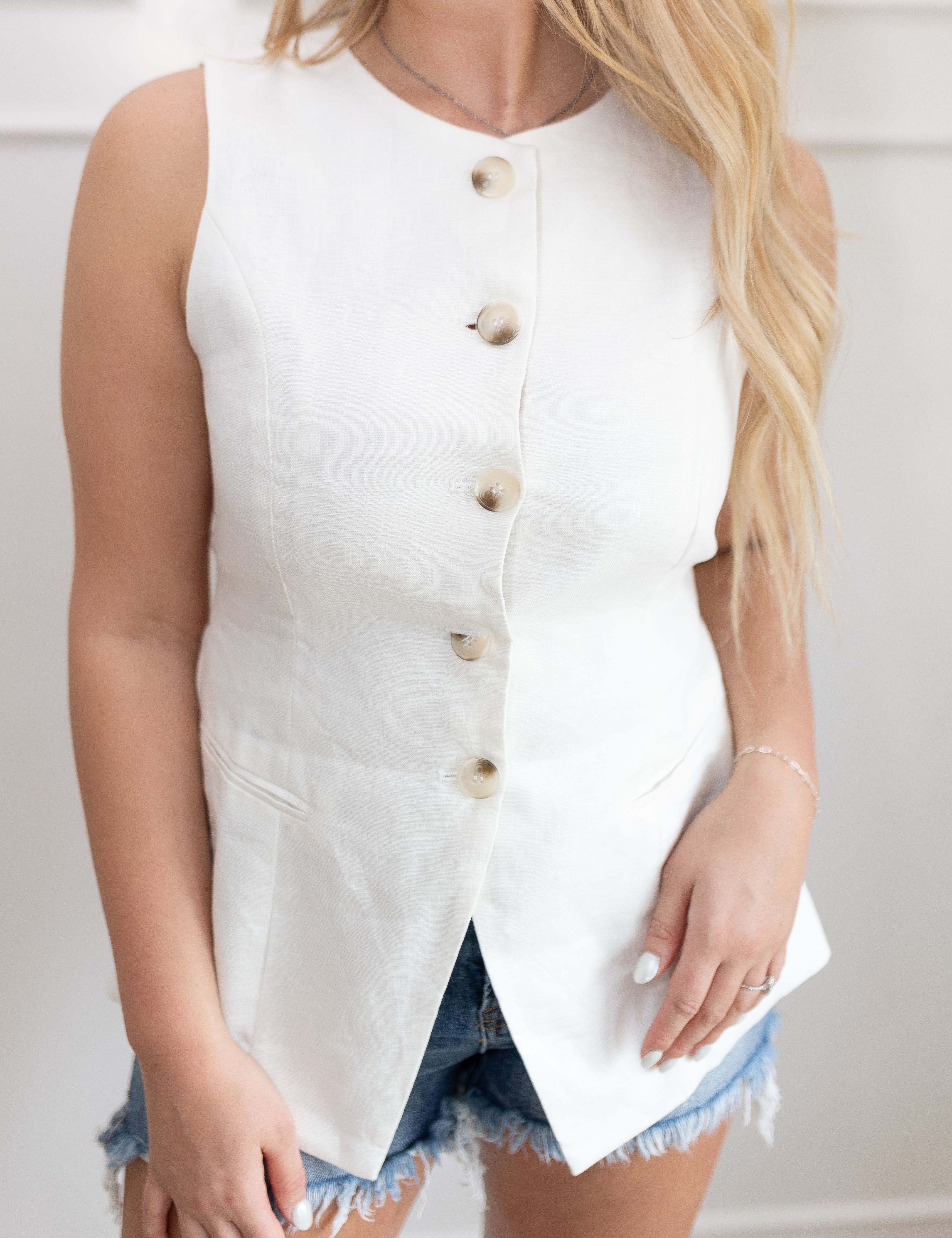 White linen button up vest top with back tie and tailored fit