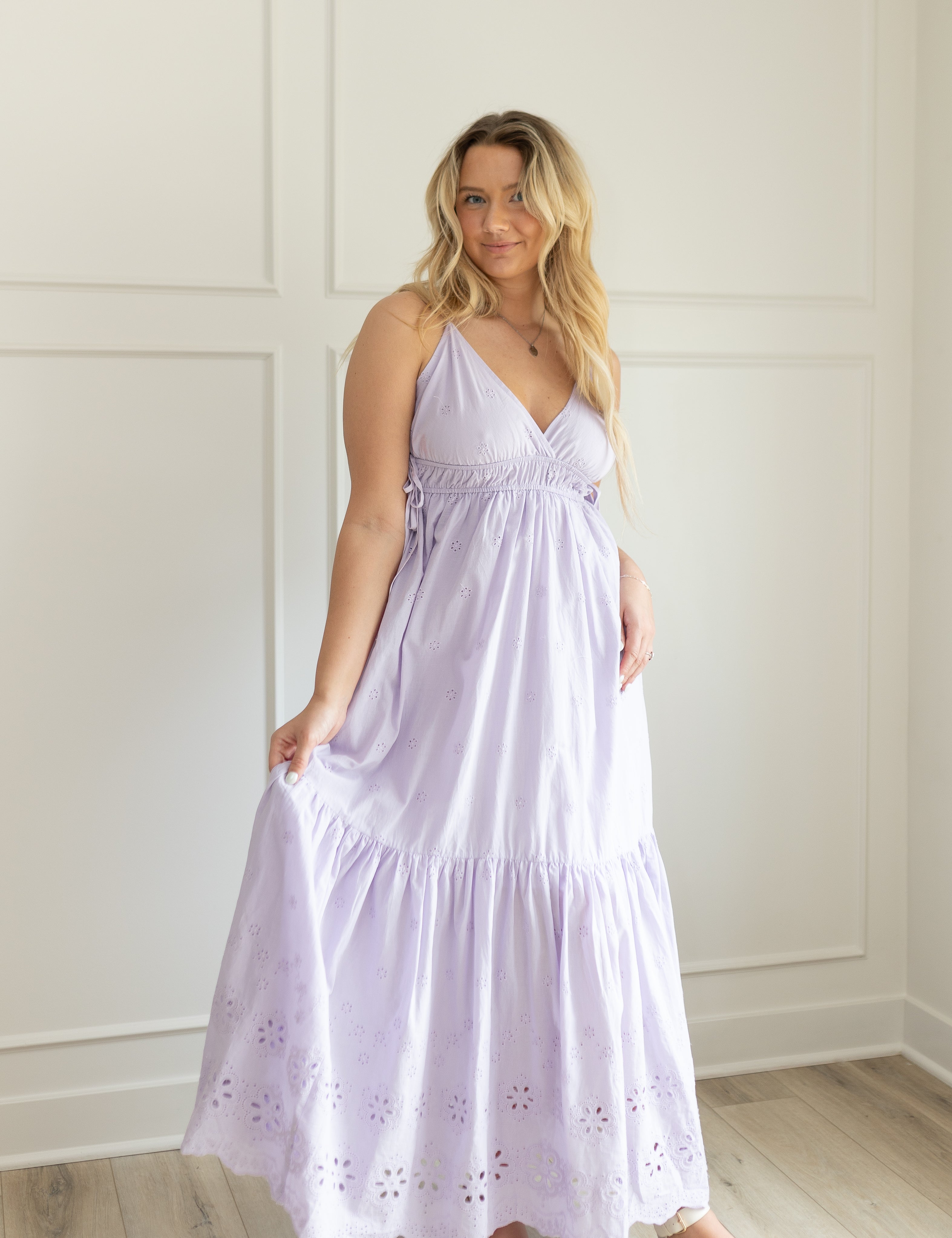 Lavender maxi dress with eyelet embroidered pattern. Adjustable for straps. Also comes in white 