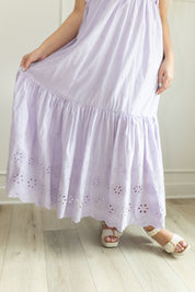 Lavender maxi dress with eyelet embroidered pattern. Adjustable for straps. Also comes in white. 