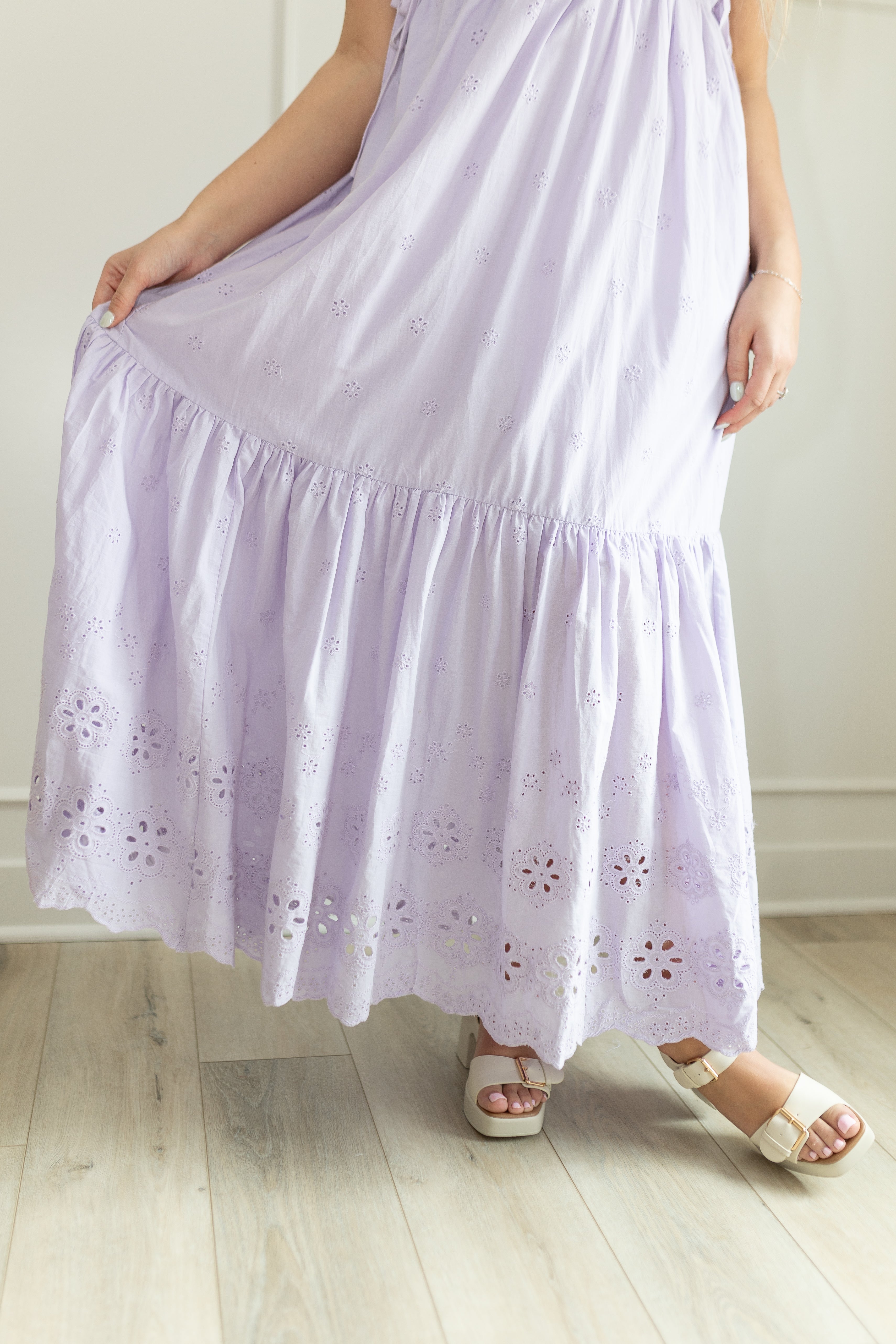 Lavender maxi dress with eyelet embroidered pattern. Adjustable for straps. Also comes in white. 