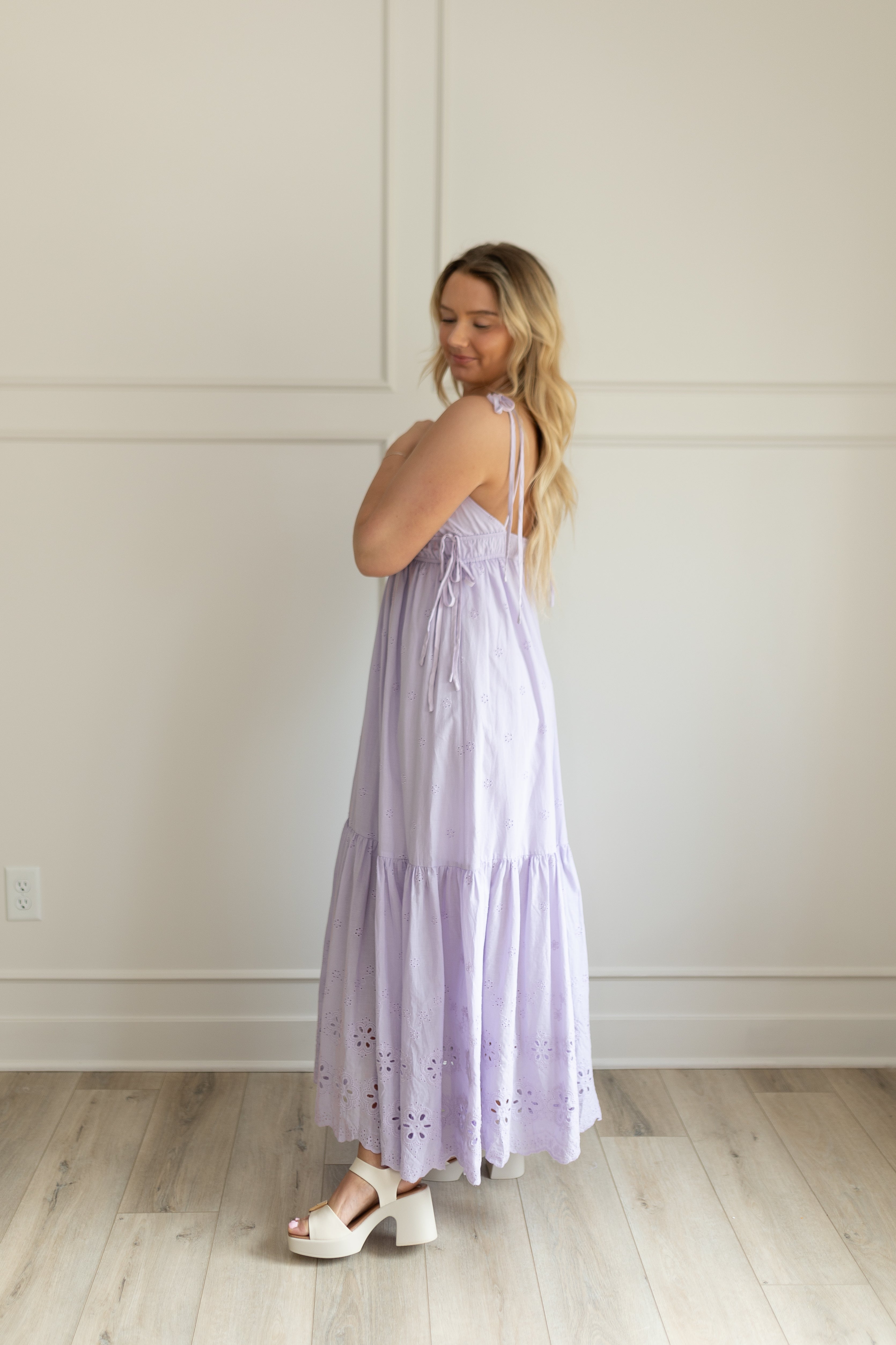 Lavender maxi dress with eyelet embroidered pattern. Adjustable for straps. Also comes in white. 