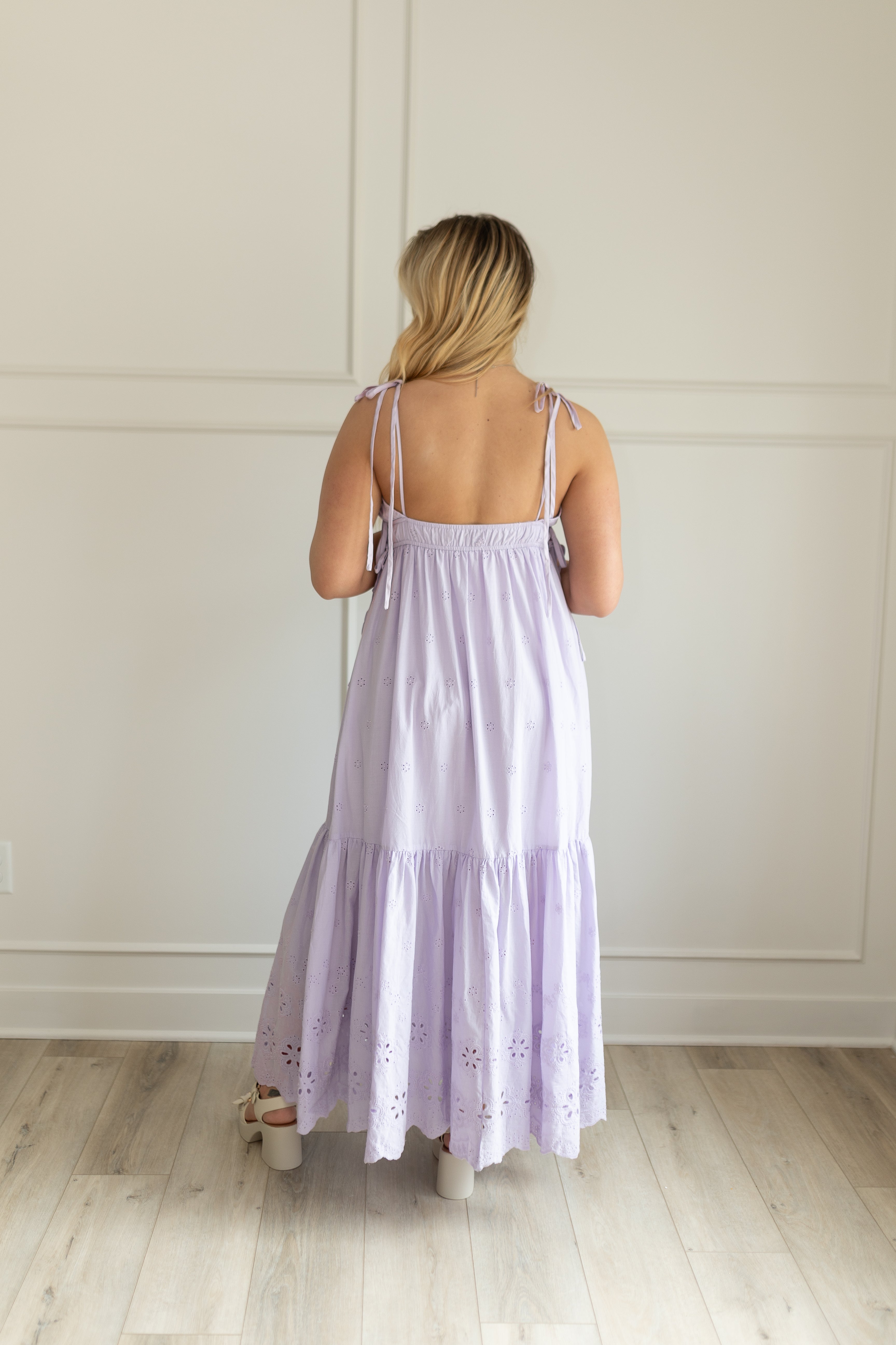 Lavender maxi dress with eyelet embroidered pattern. Adjustable for straps. Also comes in white. 