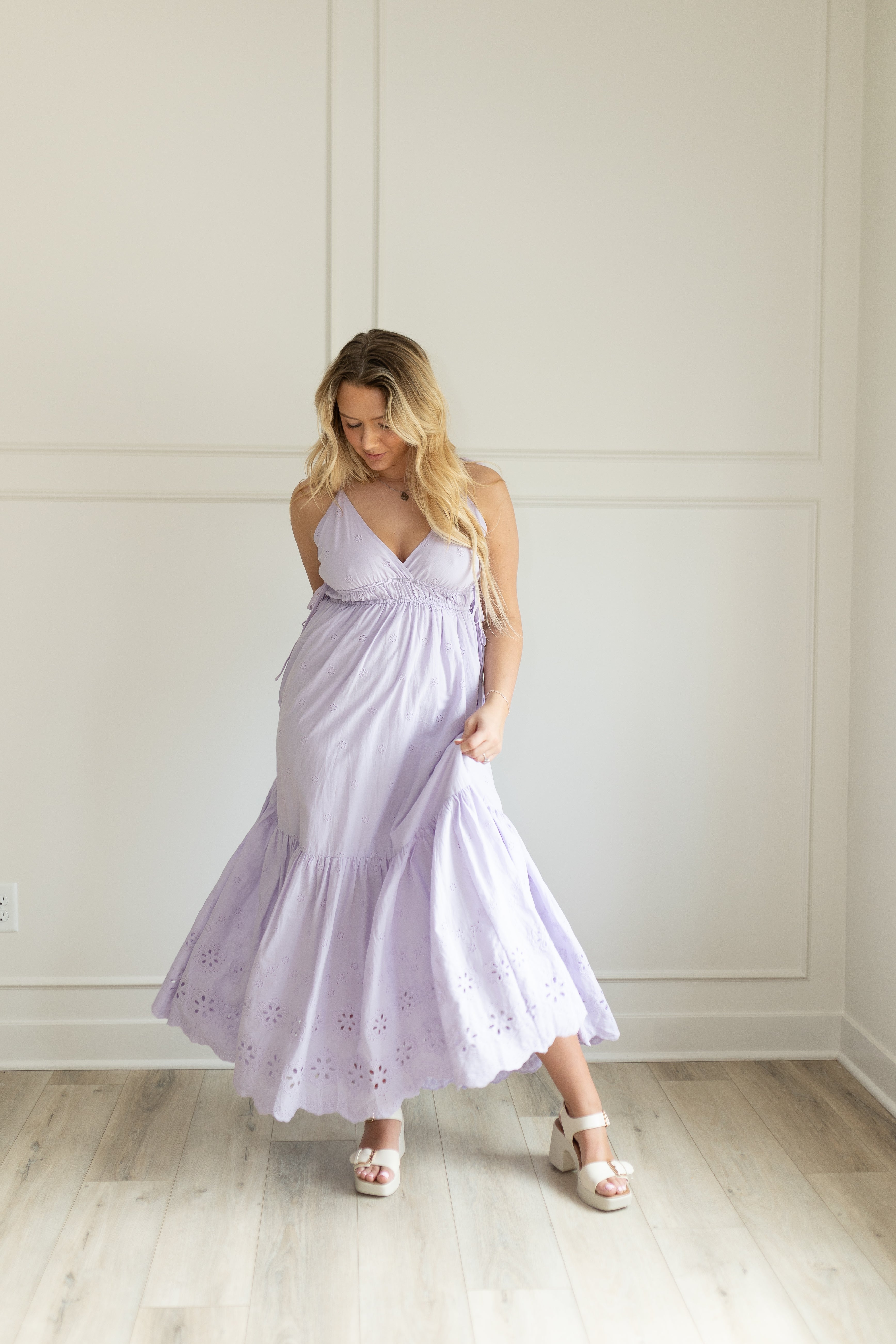 Lavender maxi dress with eyelet embroidered pattern. Adjustable for straps. Also comes in white. 
