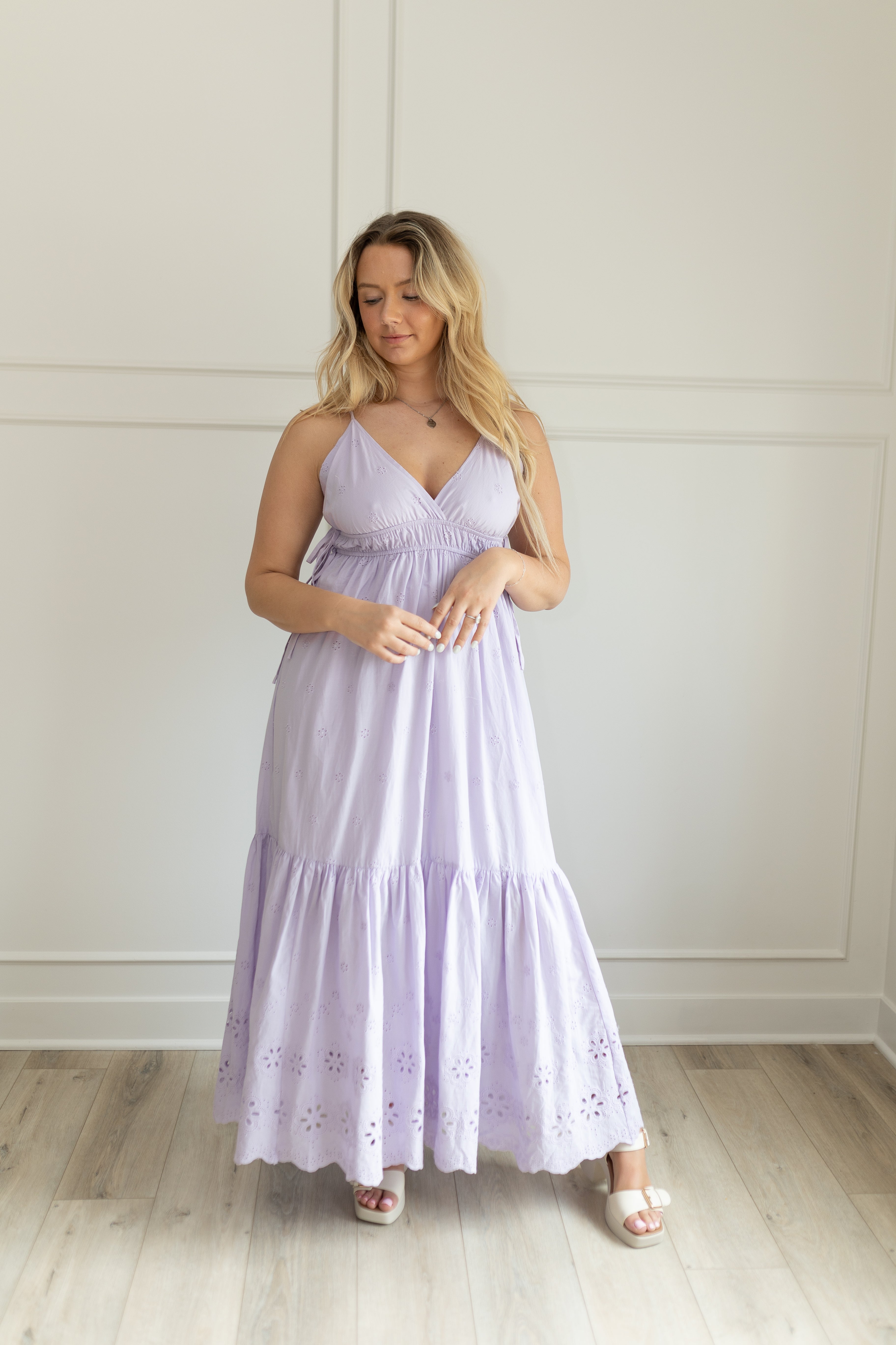 Lavender maxi dress with eyelet embroidered pattern. Adjustable for straps. Also comes in white. 
