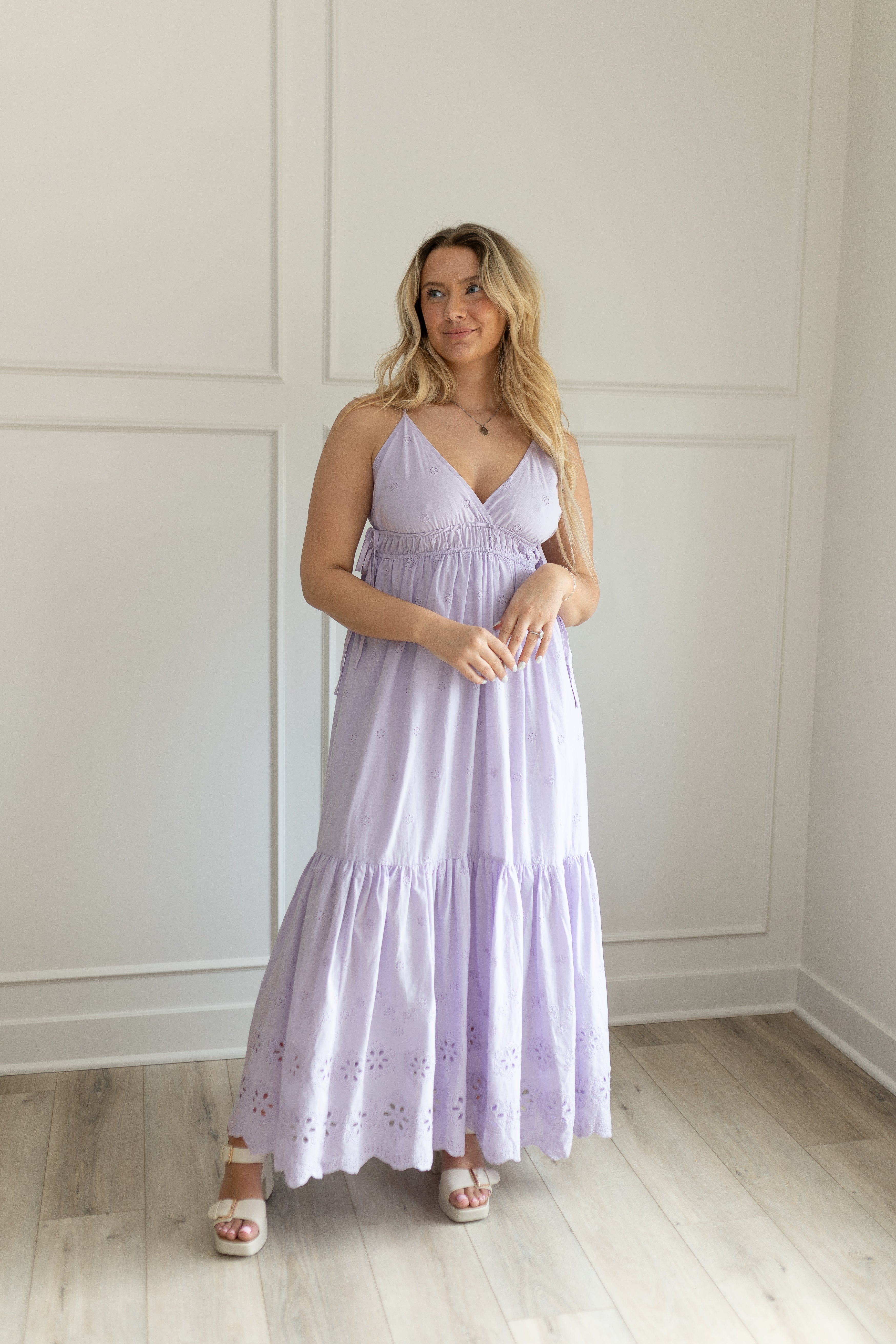 Lavender maxi dress with eyelet embroidered pattern. Adjustable for straps. Also comes in white. 