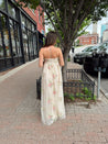 Strapless beige chiffon maxi dress with pink floral embroidery and leg slit