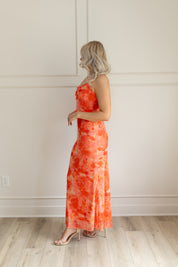 Orange mesh floral mini dress with adjustable spaghetti straps and keyhole cutout. 