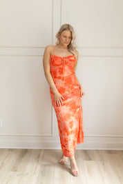 Orange mesh floral mini dress with adjustable spaghetti straps and keyhole cut out. 