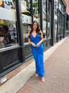 Blue watercolor maxi dress with v neckline and cowl back. 