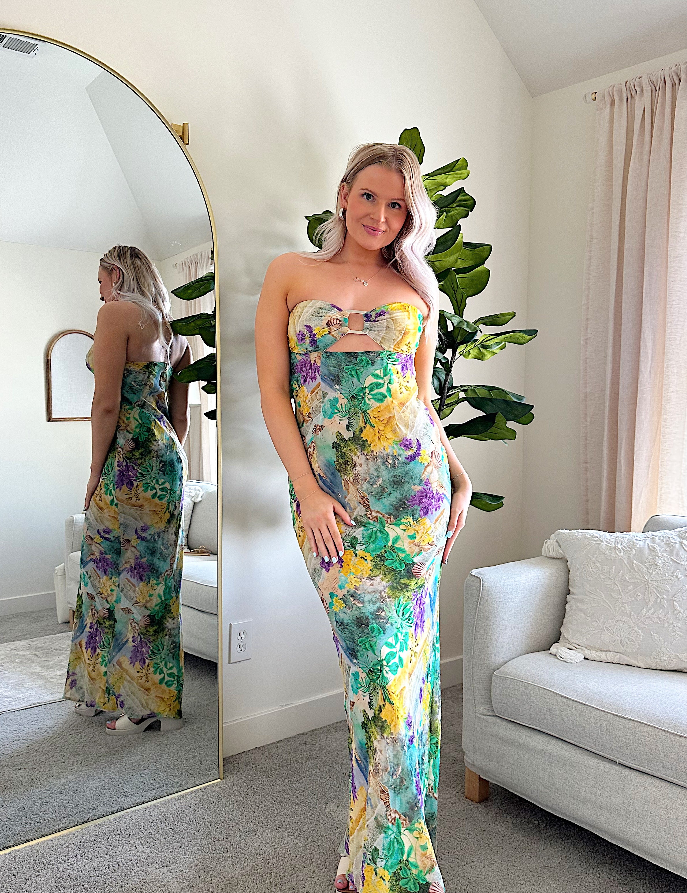 Purple and green tropical print maxi dress with cutout ring. 