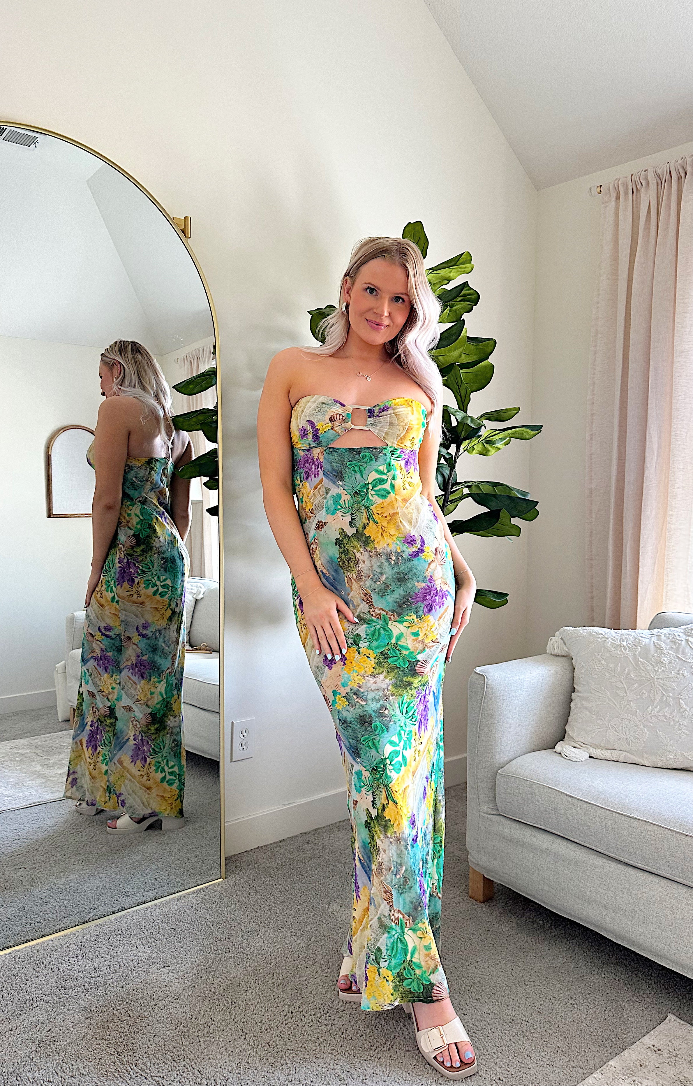 Purple and green tropical print maxi dress with cutout ring. 