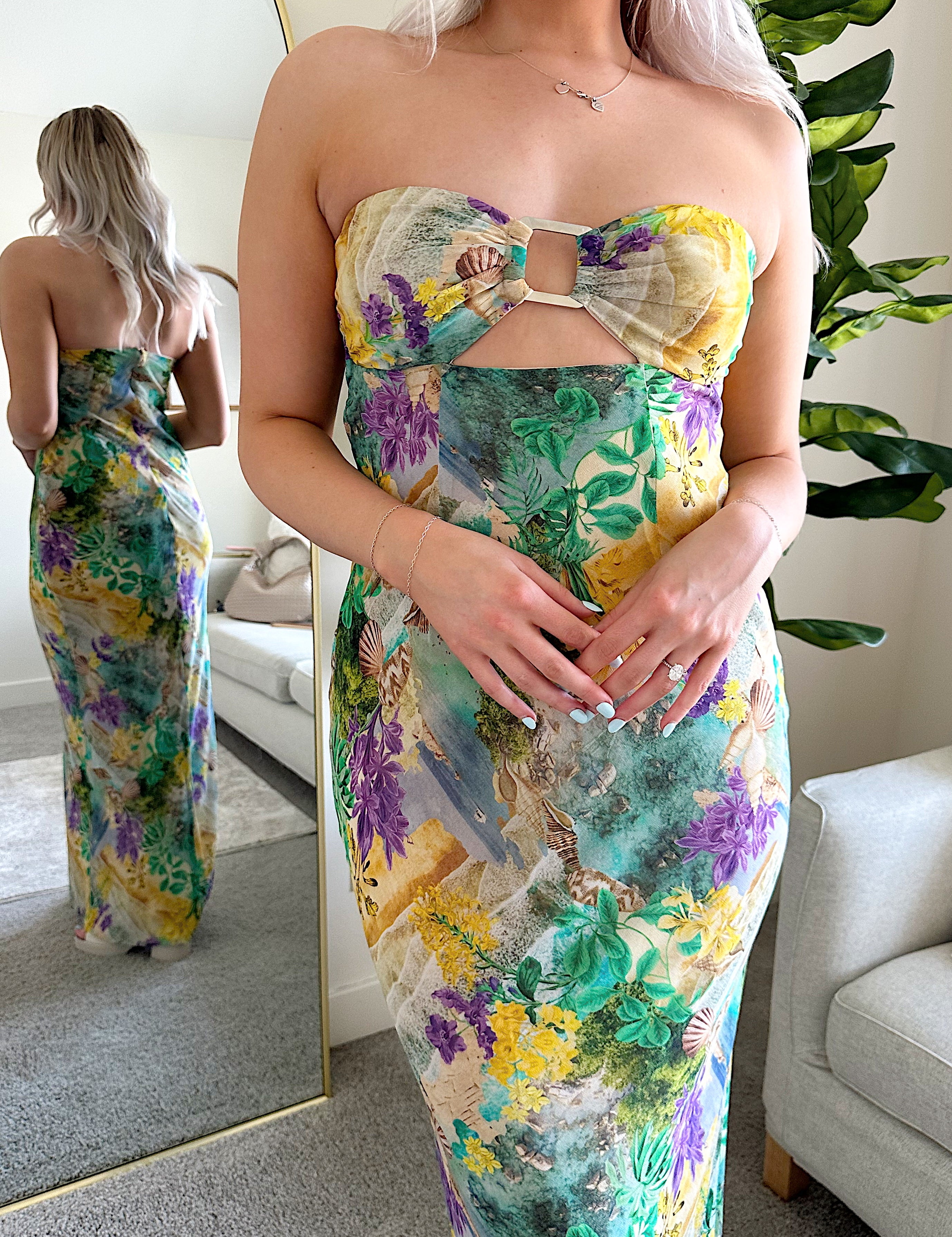 Purple and green tropical print maxi dress with cutout ring. 