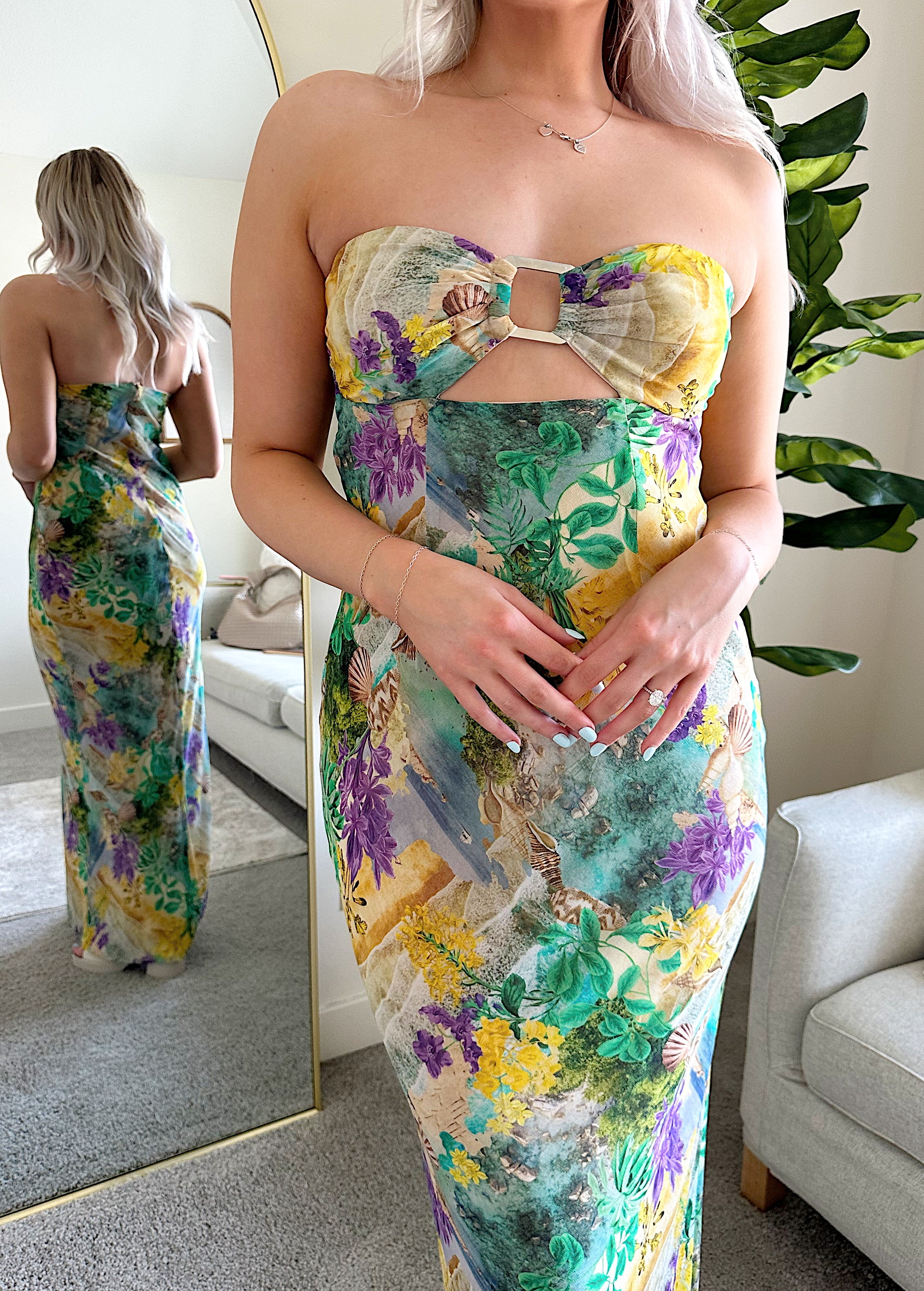Purple and green tropical print maxi dress with cutout ring. 