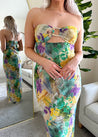 Purple and green tropical print maxi dress with cutout ring. 
