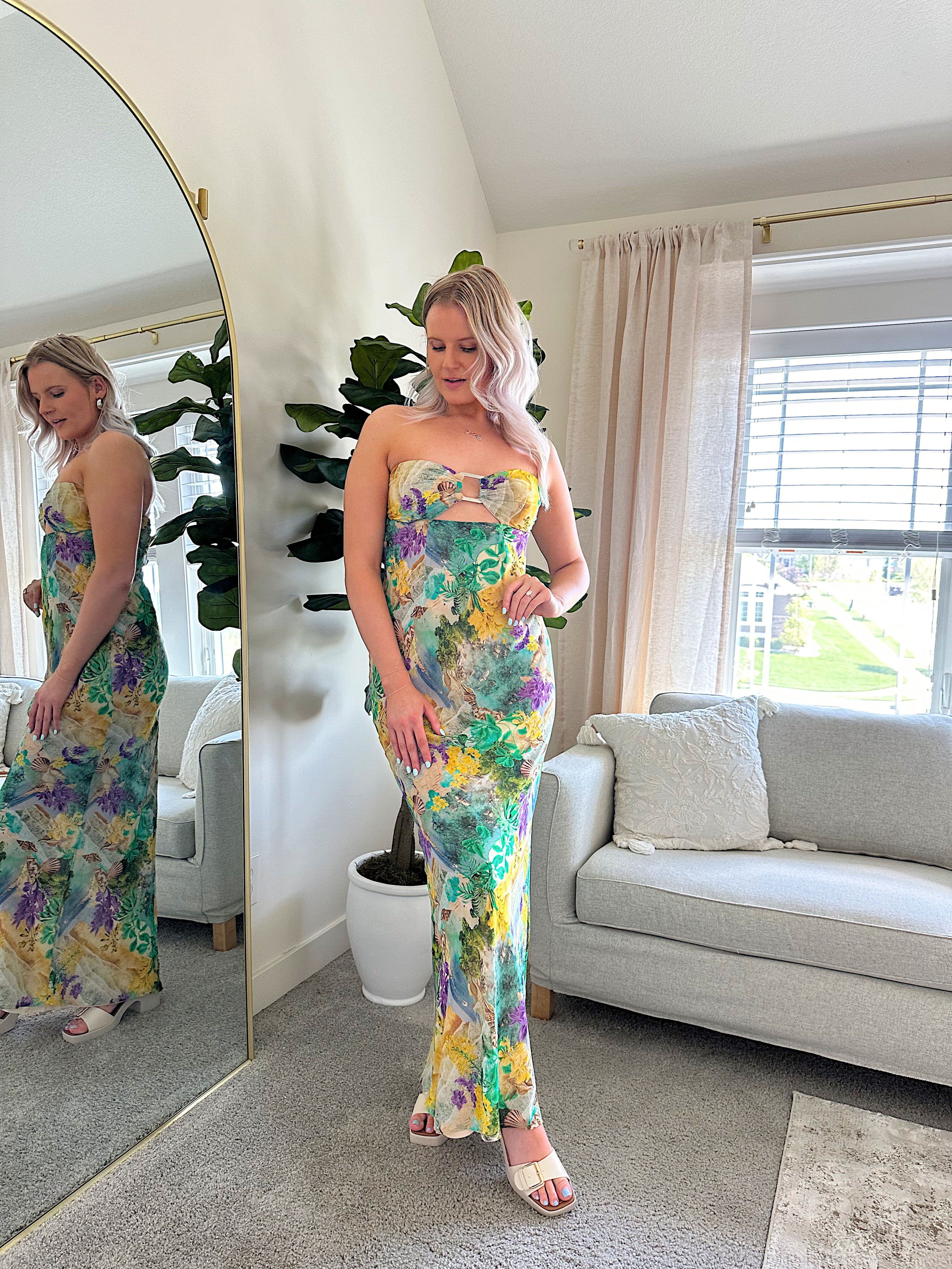 Purple and green tropical print maxi dress with cutout ring. 