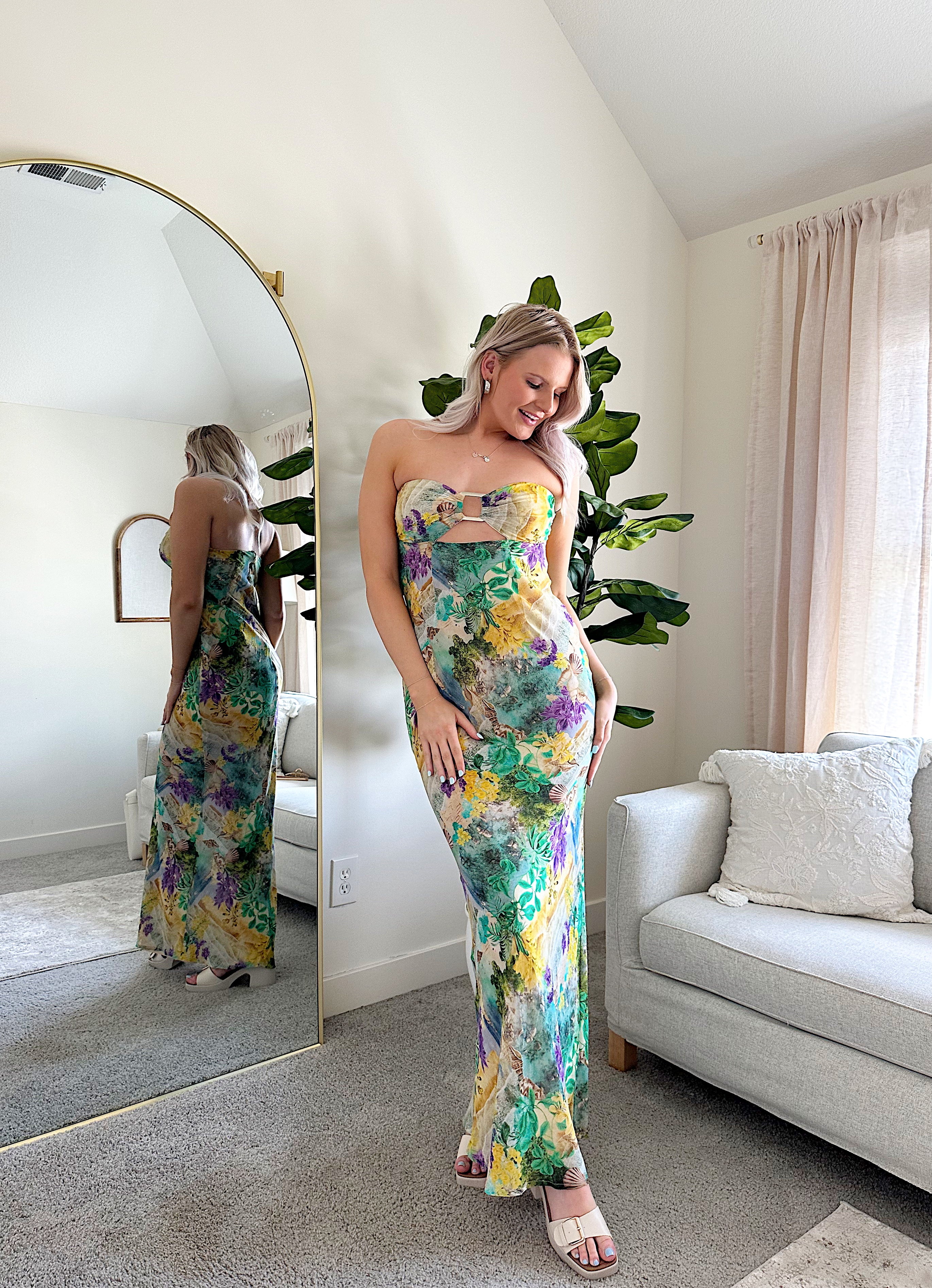 Purple and green tropical print maxi dress with cutout ring. 